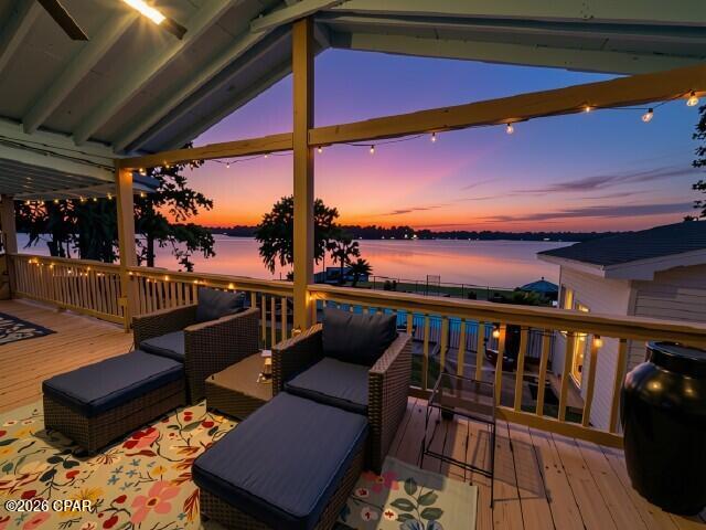 Open House
Sept. 12th 1 pm to 5 pm. 

LUXURY LAKE JUNIPER WATERFRONT RETREAT
Completely Updated | Resort-Style Amenities | Entertainer's Paradise

Discover an extraordinary Lake Juniper retreat where complete updates, quality construction, exceptional outdoor amenities, and waterfront living come together to create a private resort-style experience. Situated on approximately 1.17 acres, comprised of two lots, with expansive lake frontage, this property offers the perfect setting for a luxury vacation home, private family retreat, or exceptional vacation rental opportunity.
The home has been completely updated and upgraded, creating a fresh, sophisticated living environment that is truly move-in ready. The spacious interior is designed for both comfortable everyday living and entertaining, with generously sized rooms and a thoughtful layout.

QUALITY CONSTRUCTION
This home was purposefully built to a higher standard than typically found in a manufactured home. It features 2x6 exterior walls, 2x4 interior walls, and drywall throughout rather than traditional wall panels, providing a more substantial feel and contributing to long-term comfort and durability. The quality of construction is evident from the moment you step inside and adds an important level of distinction to this exceptional property.

YOUR OWN PRIVATE RESORT

The outdoor living spaces are where this property truly shines. A spectacular 40' x 20' heated saltwater swimming pool creates a private resort in your own backyard. With approximately 9 feet of depth, the pool is perfect for swimming, diving, relaxing, and entertaining. The pool area is fully fenced for added privacy and convenience.

Adjacent to the pool is an impressive pool house featuring tongue-and-groove walls and ceilings, vaulted ceilings, a full kitchen with icemaker, and a bathroom. This versatile space is perfect for poolside entertaining, game nights, parties, guest accommodations, or a second living area. For a vacation rental, it provides an incredible amenity that elevates the guest experience.

Lake Juniper provides endless opportunities for fishing, boating, swimming, kayaking, and simply enjoying the peaceful waterfront setting. A separate RV cover offers additional recreational and boat storage.

The property also includes additional detached structures, including a storage building with electricity and another cottage-style space offering flexibility for a workshop, studio, home office, recreation room, or ''she-shed''.

A nearby boat launch at Cat Island Walton County Park provides convenient access to the lake for boating and fishing adventures.

DESIGNED FOR ENTERTAINING & RELAXATION

Imagine summer afternoons in the pool, evenings gathered around the pool house, weekends spent fishing on the lake, and sunset cocktails overlooking the water. With its western and southwestern orientation, the property offers spectacular sunsets across Lake Juniper, creating a breathtaking backdrop at the end of each day.

A PREMIER VACATION RENTAL OPPORTUNITY

The combination of a completely updated home, substantial construction, expansive waterfront, heated saltwater pool, private pool house, multiple outbuildings, RV accommodations, and recreational amenities makes this property especially well suited for a luxury vacation rental.

Whether you're searching for a private lake escape, second home, family retreat, or income-producing vacation property, this Lake Juniper offering delivers an exceptional combination of quality, privacy, recreation, and resort-style living.

Don't miss this one of a kind opportunity! Set up your private showing today.

***Virtual staging has been used in some photos