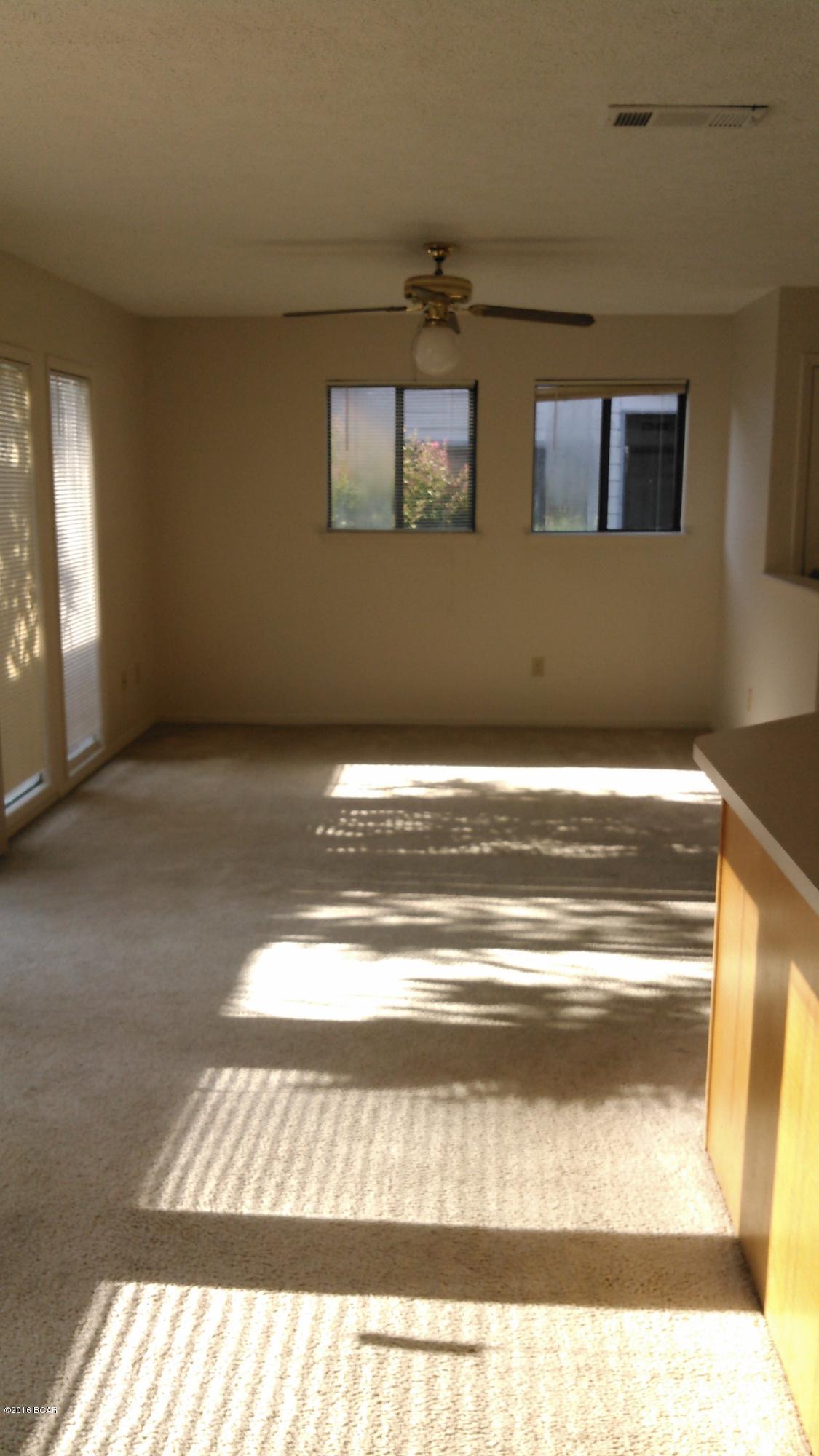 Quaint and roomy floor plan....You can step out from the living/dining area onto a  garden patio and enjoy the outdoors with privacy fencing and quiet solitude or a good book!  End unit within walking distance to downtown, one mile to 15th St shopping and amenities.  One and a half blocks to Garden Club Drive walking park.  Washer/dryer closet, open and sunny living/dining areas with secure locked storage on patio.  Sorry- but NO PETS - This is non-negotiable - unless the pet is a registered certified service dog;  for same a pet deposit is required. $80 application fee.  Owner is listing agent.  Must give current tenants 24 hour notice to show.
