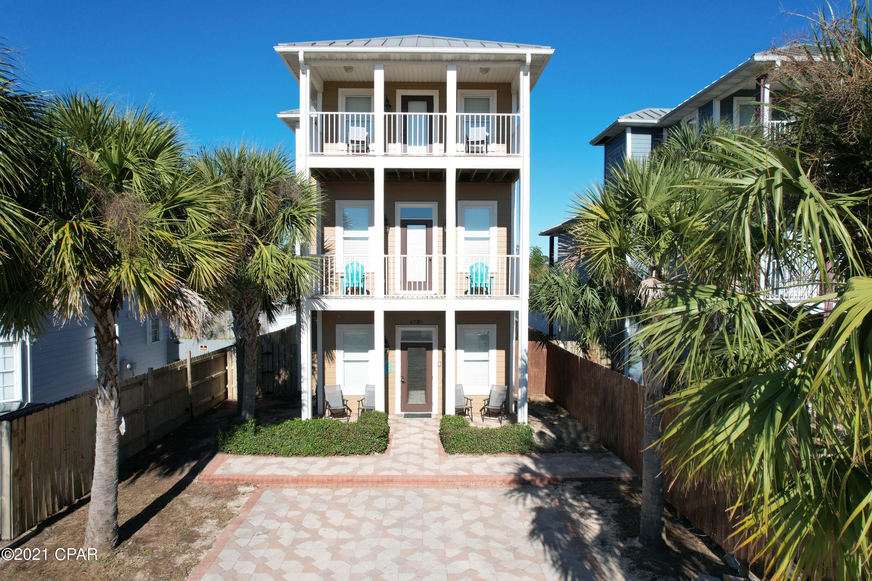 CURRENTLY UNDER CONTRACT, SELLER ACCEPTING BACKUP OFFERS

Beautiful beach house with Gulf Views - located just off Thomas Drive.  First floor living area and beautifully designed kitchen with granite counters and SS appliances.  First floor also has a bedroom with ensuite.  Second floor consists of 2 more bedrooms, each with their own ensuite bathrooms.  The third floor has its own look out lounge and balcony with views of the emerald waters of the Gulf of Mexico.  Covered large porches and balconies on all levels.  The interior is in excellent condition, with 2021 being the first year it was rented with the owner and it generated over $50k, and it is already booking rentals for 2022 Great second home or vacation rental.