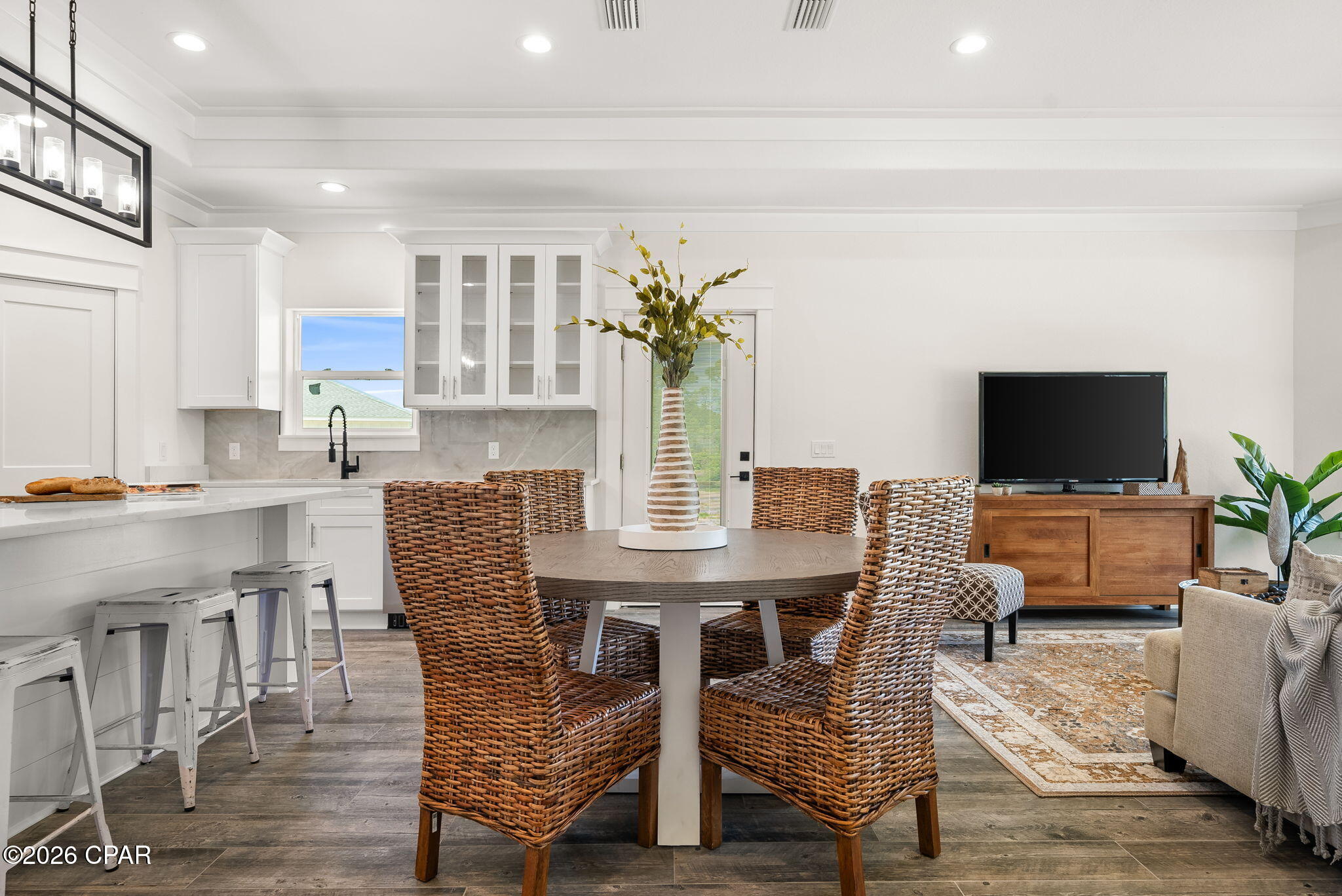 Discover easy coastal living in this inviting 3-bedroom, 2-bath home in the gated community of Laguna Haven. This single-level residence features a comfortable open layout with high ceilings, a spacious kitchen with bar seating, and a cozy living area ideal for relaxed gatherings. The primary suite offers a private retreat with a walk-in closet and well-appointed bathroom. Enjoy your mornings on the covered patio overlooking a low-maintenance yard, perfect for anyone seeking convenience and privacy. Located on the quiet west end of Panama City Beach, you're just minutes from emerald waters, popular beachfront parks, and the shopping and dining of Pier Park. A wonderful full-time home or beach getaway in a peaceful, well-kept neighborhood!
