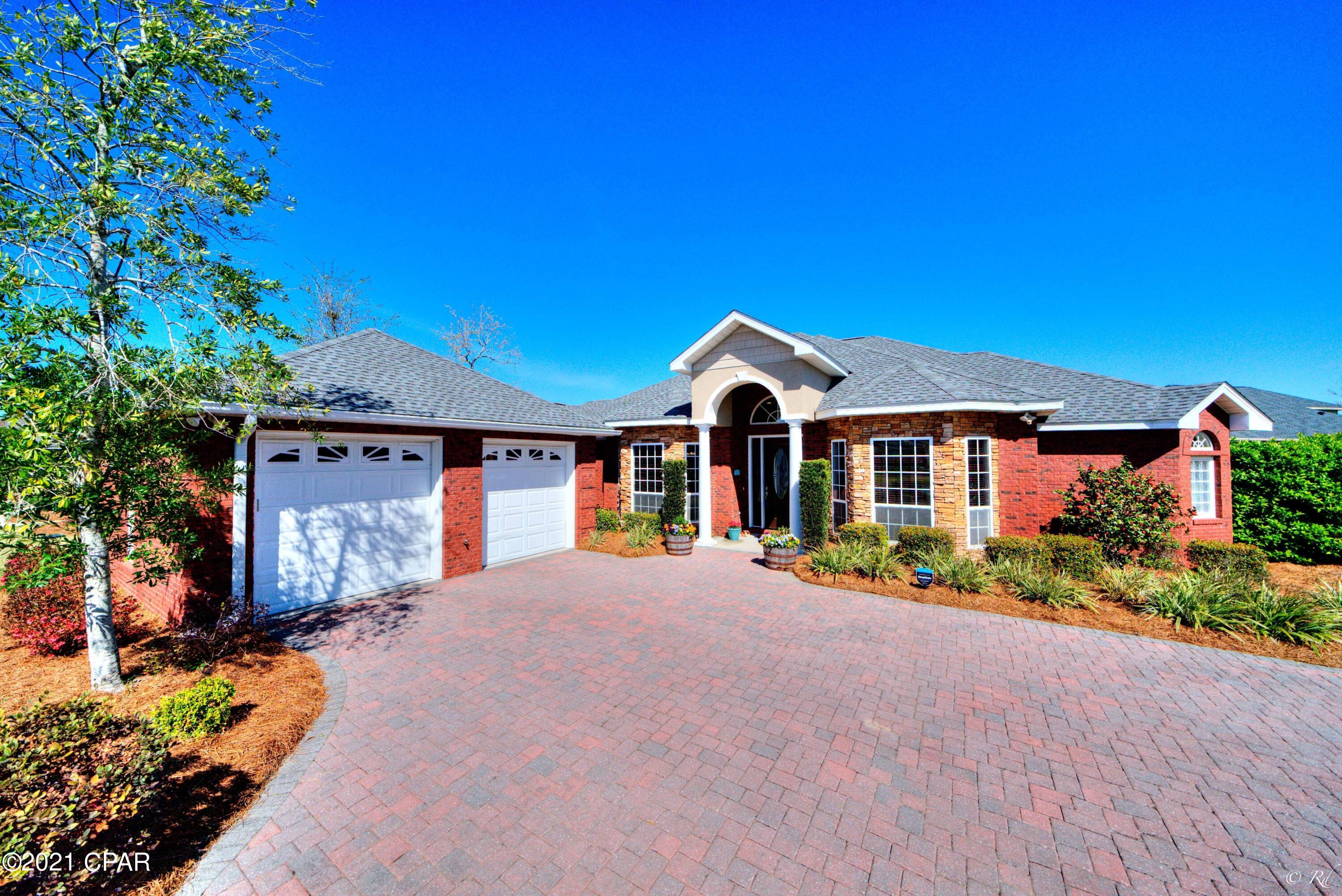Stunning executive style 5 bedroom, 3 bath brick home in the desirable community of Grant's Mill. This home is welcoming with well manicured, lush landscaping. The high ceilings will wow you with beautiful tray detailing and recessed lighting. The living room boasts a fireplace and a large, built-in entertainment center with plenty of cabinets for storage space. There is a formal dining area with a tray ceiling and bullnose archways, perfect for hosting family and friends. The eat-in kitchen is equipped with stainless appliances including a range hood, granite counters, tile backsplash, a kitchen island, a plethora of cabinets and a breakfast bar. There is also a large laundry room off the kitchen with a sink and cabinets. This home features a split bedroom floor plan offering plenty of peace and privacy with the master bedroom and office space separate from the three additional bedrooms. The master bedroom is spacious and features a tray ceiling, large walk-in closet, a private ensuite and double doors leading to the backyard. The large master bath boasts a whirlpool tub, separate tiled shower with glass doors and a double vanity. The additional 4 bedrooms share a full bathroom with a tiled shower and large vanity with granite counters. There is also an additional full bathroom with outside access from the pool area for the ultimate convenience. This home boasts columns, recessed lighting and formal decorative ceilings in the main living areas of the home. This home has been recently updated with new carpet in the bedrooms and fresh paint throughout. The backyard features an inground pool with a fountain and well manicured landscaping. There is also a brick courtyard that is perfect for hosting family and friends while enjoying the sunset in the privacy of your own backyard. This home is located near many parks including parks with public boat ramps, schools, restaurants, shopping and more. This home is a must-see!