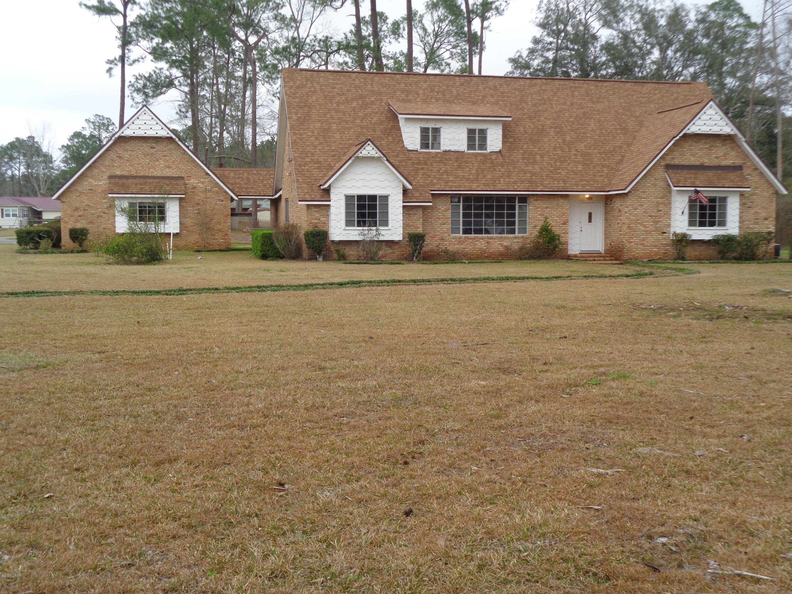 Very large home for rent in Graceville, Fl. Home has 4 large bedrooms plus office. Formal Living room and large family room with fireplace. Large kitchen with lots of cabinets and newer appliances. Also has a large room over the garage.