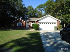 Very nice single story brick home in Lynn Haven. 10 ft ceilings in living area, fireplace, split bedroom floor plan, large master suite, breakfast bar and screened porch make this home a must see! This home is located close to schools, shopping, dining, entertainment and a short drive to Tyndall AFB or the Navy Base.