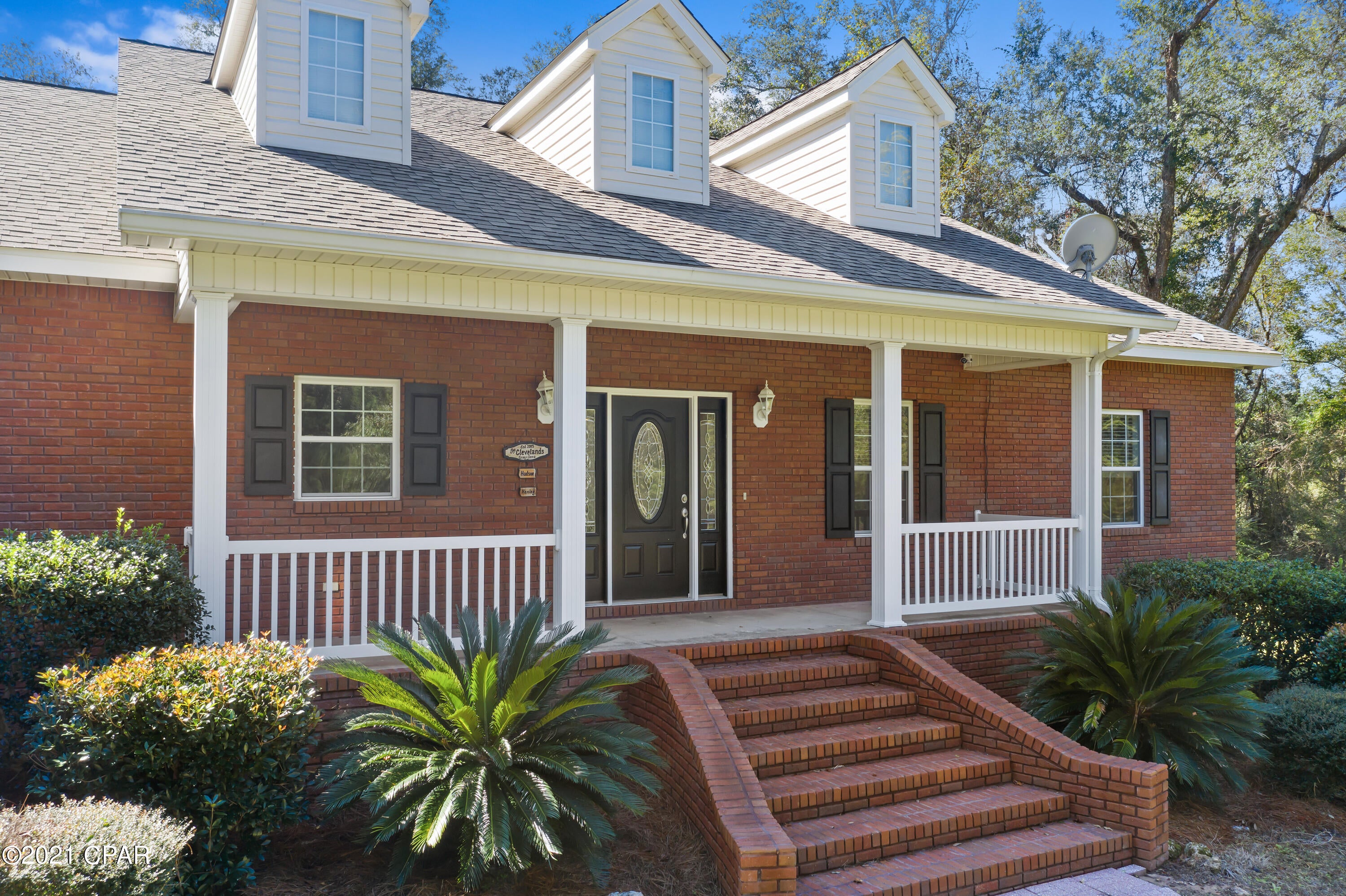 Wow!  This home has it all!  This three bedroom, two and a half bathroom home is located in the desirable Piney Grove area.  The living room is oversized and  features a cathedral ceiling.  The kitchen is large and is a chef's dream with gas appliances, Corian countertops, and nice cabinetry.  This home is situated on a double lot with two nice outbuildings!  The open barn has a concrete floor, electric and is 41x24.  There is an additional storage area is 41x12 with lots of shelving.  There is also a 36x24 pole barn with a concrete slab.  Two lean tos are 36x16 each.  This home is a MUST SEE!