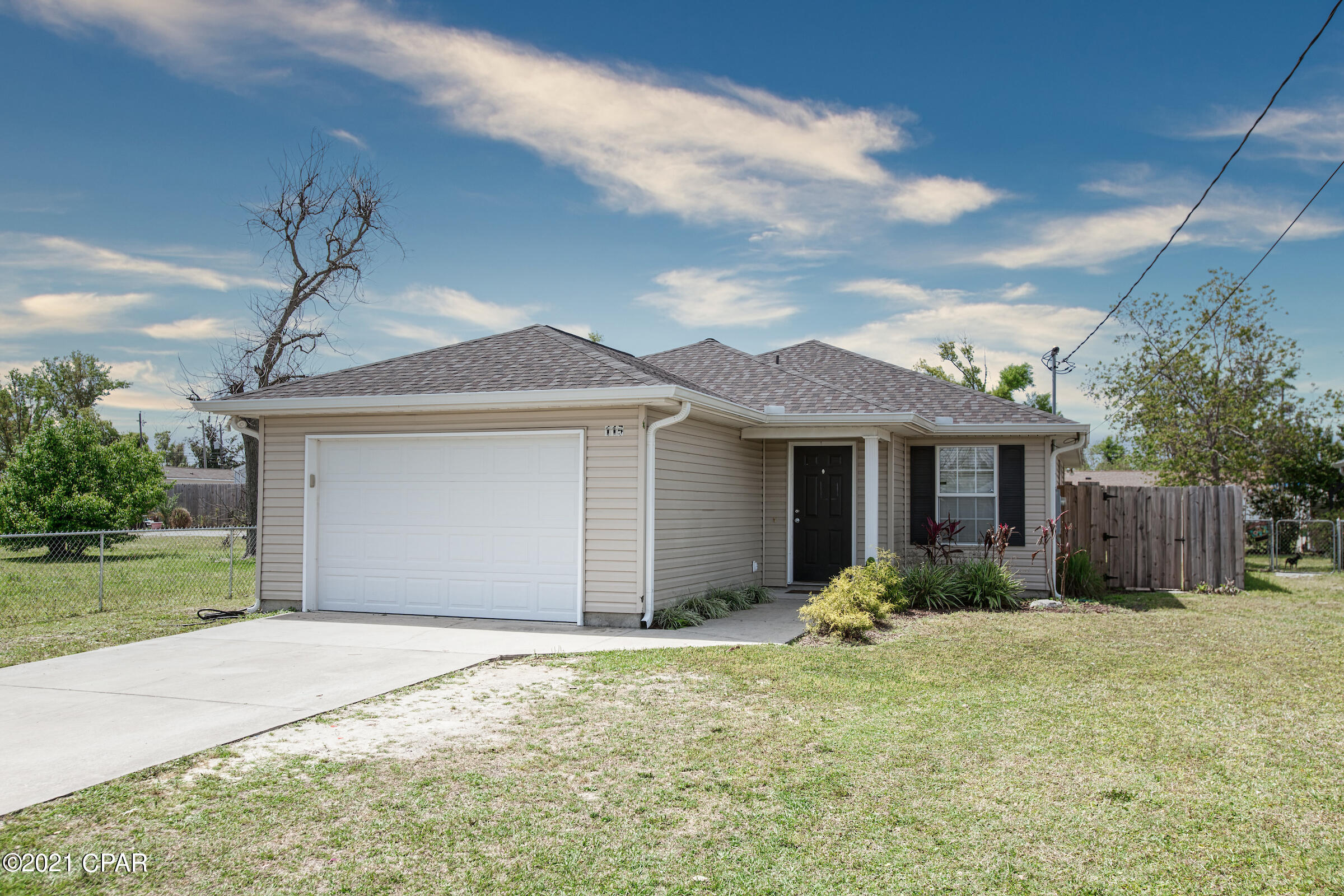 Come check out this 3/2, open floorplan home! This house features laminate flooring, spacious bedrooms, bronze light fixtures, ceiling fans throughout, and french doors in the dining room! The kitchen is completely open to dining and living room and offers a breakfast bar, custom cabinetry, pantry and plenty of counter space. Privacy fenced yard with covered patio! Conveniently located close to Tyndall Airforce Base.