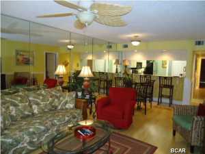 Totally renovated Beach View/Golf Villa condo that shows like new. Never rented and located just a short walk to the beach in a gated subdivision. Entry way is complete with gorgeous ceramic tile and wall treatments. The upgraded kitchen has custom cabinets with granite counter tops and stainless appliances. The guest bedroom with two full sized bunk beds is nicely decorated, cozy and warm for children or friends who will visit. The master bedroom with a West Indies feel includes crown molding and a laminate wood floor for easy care. Both bathrooms are accented with new light fixtures and new vanities. Edgewater is a full service resort with 3 restaurants, 8 tennis courts ,11 pools, game room, a coffee shop and a 9 hole golf course. This is one of the most unique and stunning Beach