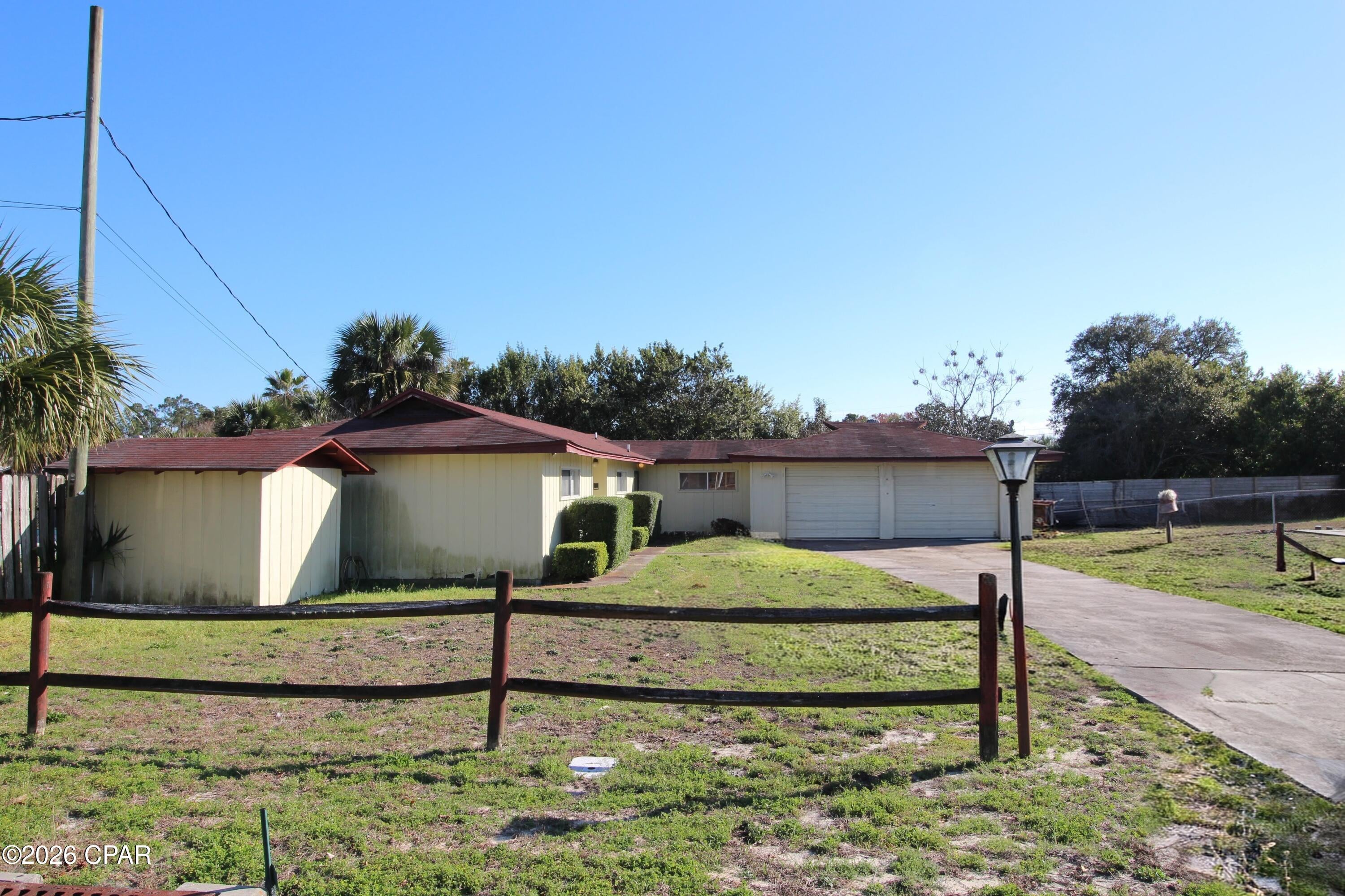 Attention all Investors!!  Owners are READY TO SELL!! Two buildable lots in Lullwater.  Each lot is 60 x 120 for a total site of 120 x 120 or .33 acres.  Property is conveniently located near the beautiful beaches, Pier Park, area restaurants; pirate show and top golf. Property is in need of a little TLC and design ideas.  Improvements are sold ''As Is''.  Home on the property has the following features; living room; dining room; family room; kitchen; 3 bedrooms; two baths; two car garage; in ground pool, etc.  Keep the home or demolish and build.  Don't miss this opportunity!!