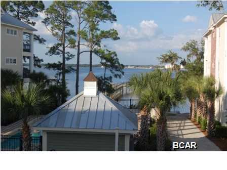 Sit on your porch & watch the sites. This condo has all of the updates you can ask for. Sub zero fridg. Bosch dishwasher, gas stove with 6 burners. Wet bar with ice maker & wine chiller. Real hardwood floors, 10 ft. ceilings, crown molding & everything you could ask for. Waterhaven is a non-rental community, with a club house, which includes a fitness center, livingroom with small kitchen, summer kitchen with Viking appliances & grill area.