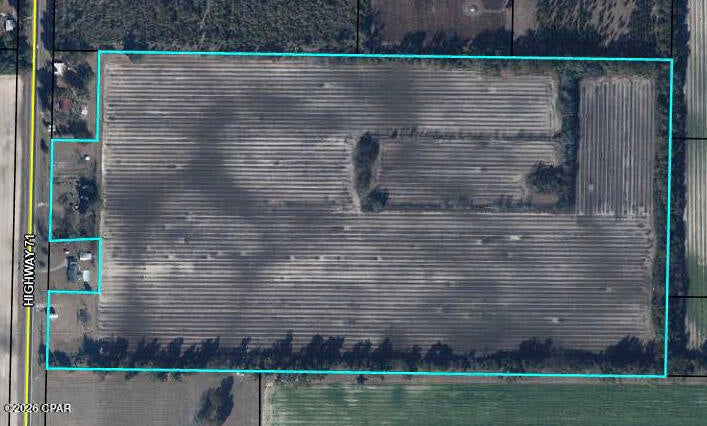 Prime 76-Acre Property in Jackson County, Florida
Discover 76 acres of prime cropland in Jackson County, Florida--ideal for agricultural production and rural living. With dual access points off Highway 71, this tract offers excellent convenience for equipment, deliveries, and future improvements.
Property Access:
This property features two convenient access points off Highway 71: approximately 241 feet of frontage at one entrance and 400+ feet of access near the center of the tract, providing flexible entry for farming and development needs.
Infrastructure & Amenities:
The property includes grain storage tanks--two 5,000-bushel tanks with dryers being operated by 3-phase power. A newer well (6-inch) installed in 2023 is suitable for drip or low-pressure irrigation; a larger pump is recommended for commercial-scale irrigation. Along the central road frontage, approximately 2 acres feature pecan and peach trees, a garden spot, and a shed.
Versatile Land Use Options:
This tract is well-suited for a livestock operation or horse farm, with roughly half the acreage planted in Tifton 9 Bahia grass. It also offers strong potential for vegetable production or a fruit orchard, making it an adaptable property for a wide range of agricultural goals.
Convenient Location:
Enjoy a paved-road setting just minutes from the conveniences of Marianna and Greenwood, Florida. The property is also approximately 25 minutes south of Dothan, Alabama, and about an hour west of Tallahassee, offering an easy commute to larger hubs. For outdoor recreation, nearby hunting and fishing and opportunities are close at hand.  Panama City Beach is roughly an hour away for boating, fishing, and time on the water. Schedule a showing--opportunities like this 76-acre tract don't last long.