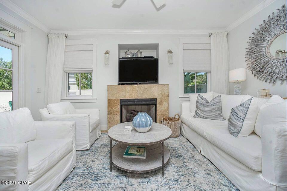 : Located SOUTH of 30A with GULF VIEWS is this 2 story, 2 bedroom & 3 full bath coastal cottage designed with luxurious furnishings by Beau Interiors & Restoration Hardware in the Gated Community of Sunset Beach nestled between Alys Beach and Rosemary Beach just Steps from the Deeded Beach Access & Beachfront Pool.One of the true treasures of this home are the large porches and the private walled in courtyard that give the home lots of additional outdoor living spaces.The spacious upstairs master bedroom has balconies on both sides.Swing open the french doors and enjoy Beach Breezes & some Gulf Views or relax on the second large balcony overlooking the private courtyard which is accessible from the upstairs guest bedroom with ensuite bath as well.The home can comfortably sleep up to 8.