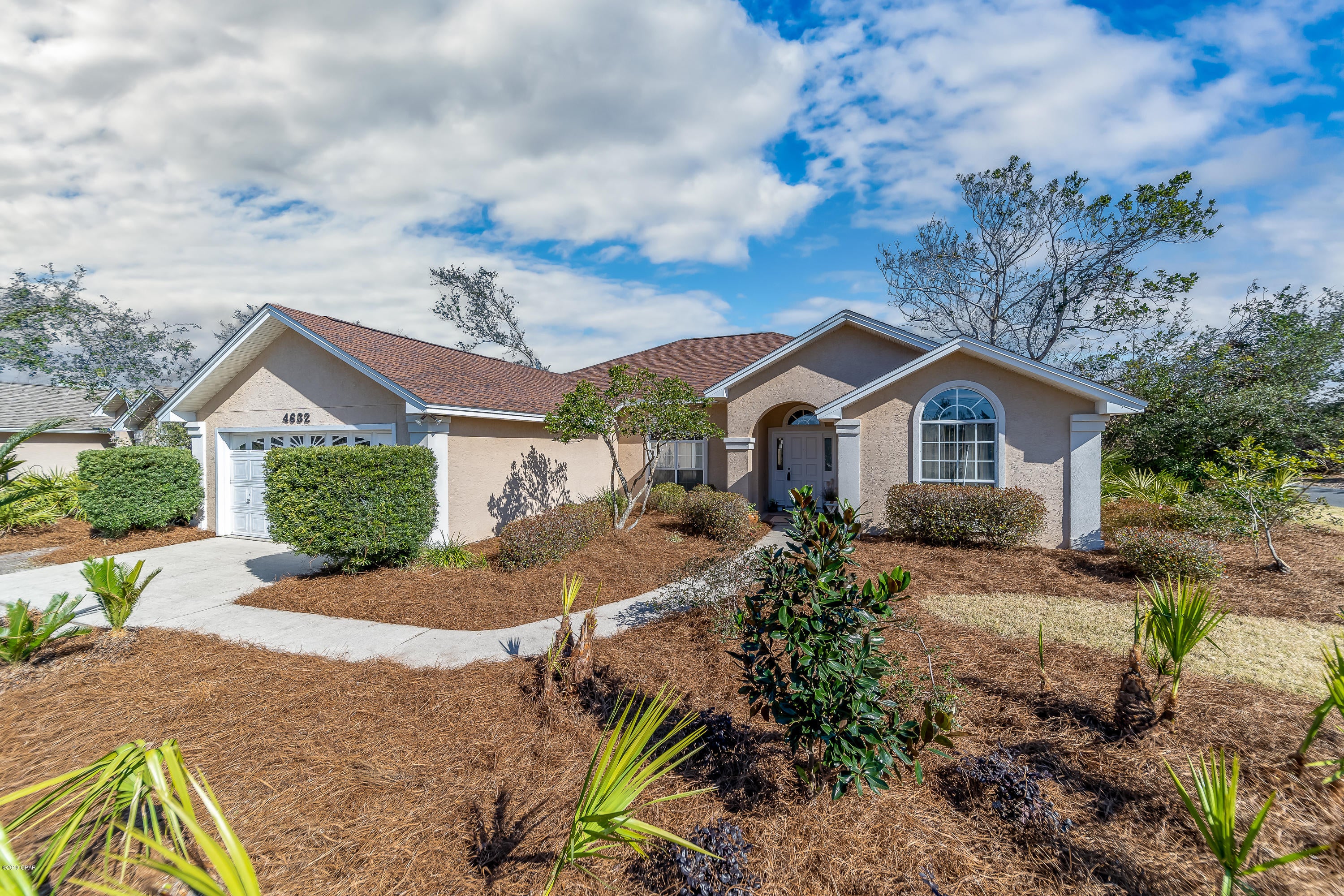 CURRENTLY UNDER CONTRACT, SELLER ACCEPTING BACKUP OFFERS.Best home price in Upper Grand Lagoon! Spacious home in the desirable Delwood community near Bay Point! Beautifully landscaped corner lot, 3 bedrooms, large screened porch and 2-Car garage! Spacious and open living / dining. The kitchen is large with abundant counter space. The master suite is separated for privacy and features a large walk-in closet and bath with double vanity, separate soaking tub and large walk-in shower. The master also has french doors opening directly to the screened porch. Spacious secondary bedrooms have large closets, and there is also a ton of additional storage throughout this home. Great location convenient  to shopping, restaurants, Navy Base and short trip to the white sandy beach. Seller will even incl