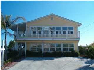 Upstairs unit. Spacious. All utilities included(electricity, gas, water, basic cable). Very spacious 2 bedroom 2 bath near the beach. It has a fenced shared backyard. NO SMOKING. Lawn Care also included.