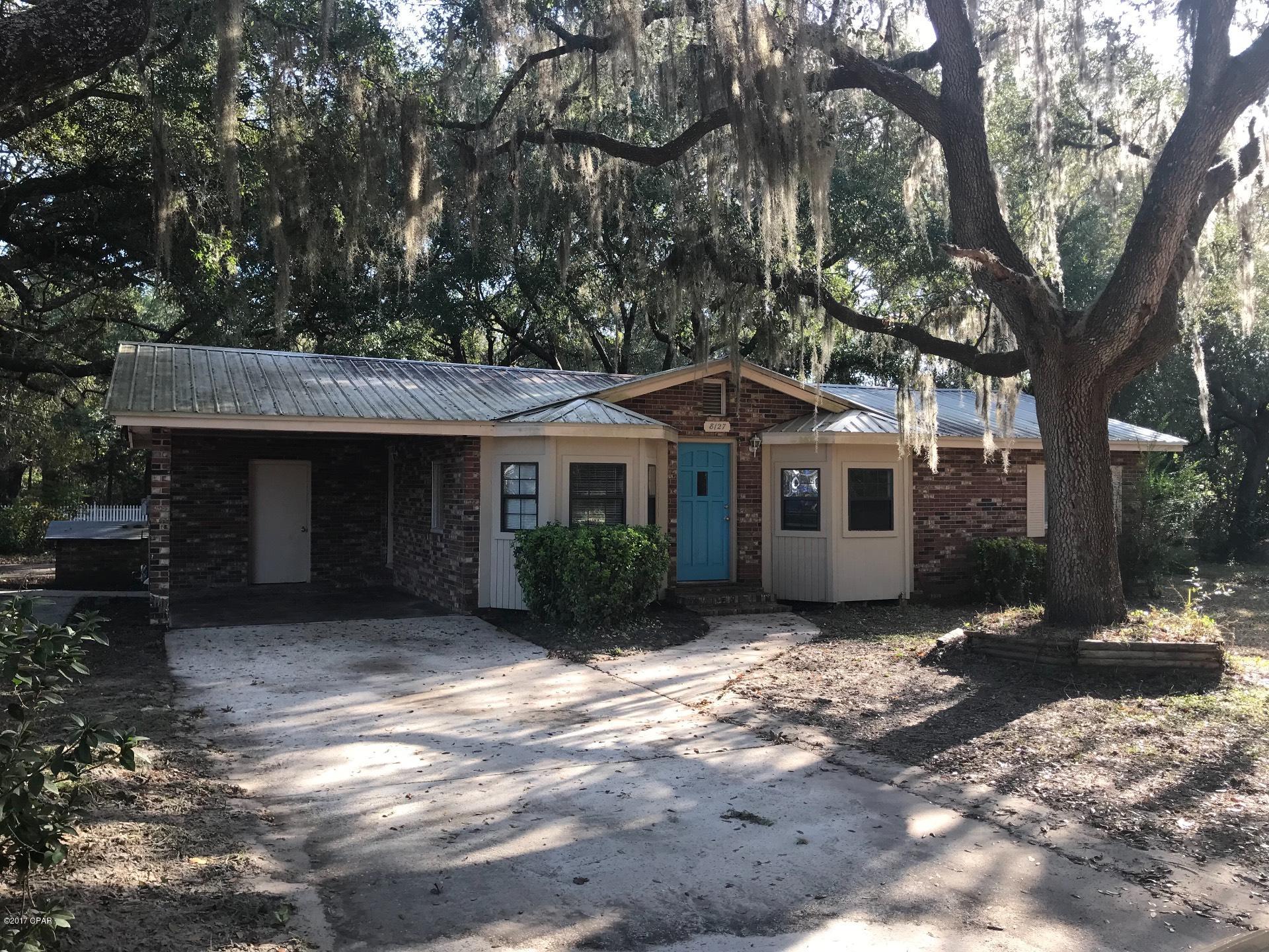 Brick home close to shopping. Screened in porch, storage area with washer/dryer connections, and carport. Water is on well.



All measurements are approximate.