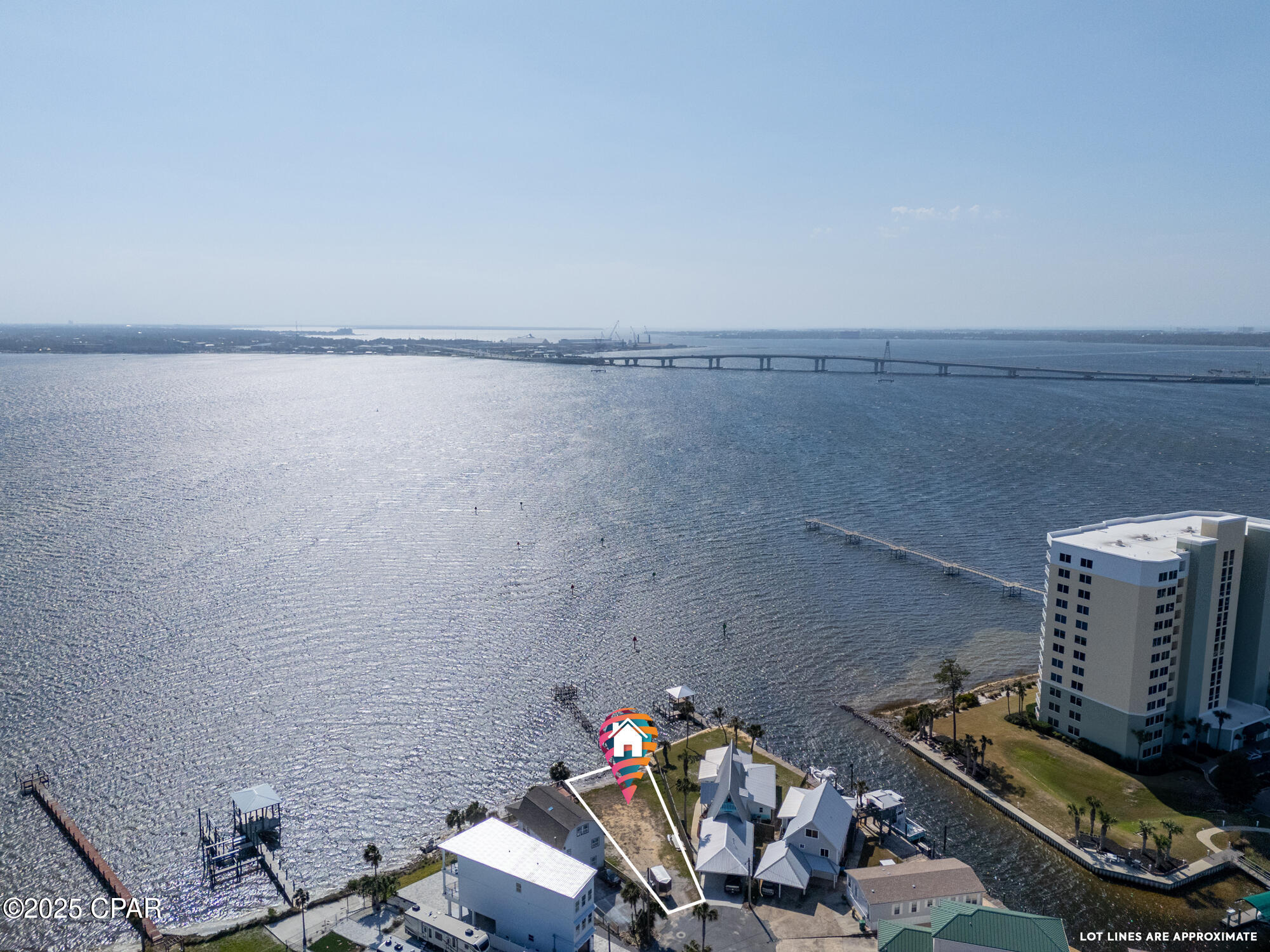 WOW!!!!! Build your dream home on this wide water bay front Panama City Beach lot right around the corner from a Marina and less than a 5 minute drive to our beautiful white sand beaches!!!  Gas line availability is right down the street and tap fee has been paid. I have 20 pages of building plans that can be provided upon request of a BEAUTIFUL home that was going on the lot before sellers decided to sell. It's a $20,000 value...free of charge!! The building possibilities are endless on this GORGEOUS cleared and ready to build on beauty. Build right away or just add a dock, park your boat, and come down for a weekend of fishing. Less than a 10 minute ride out to the open gulf. Hurry before this one gets away! All information is approximate and should be verified by buyers if important.