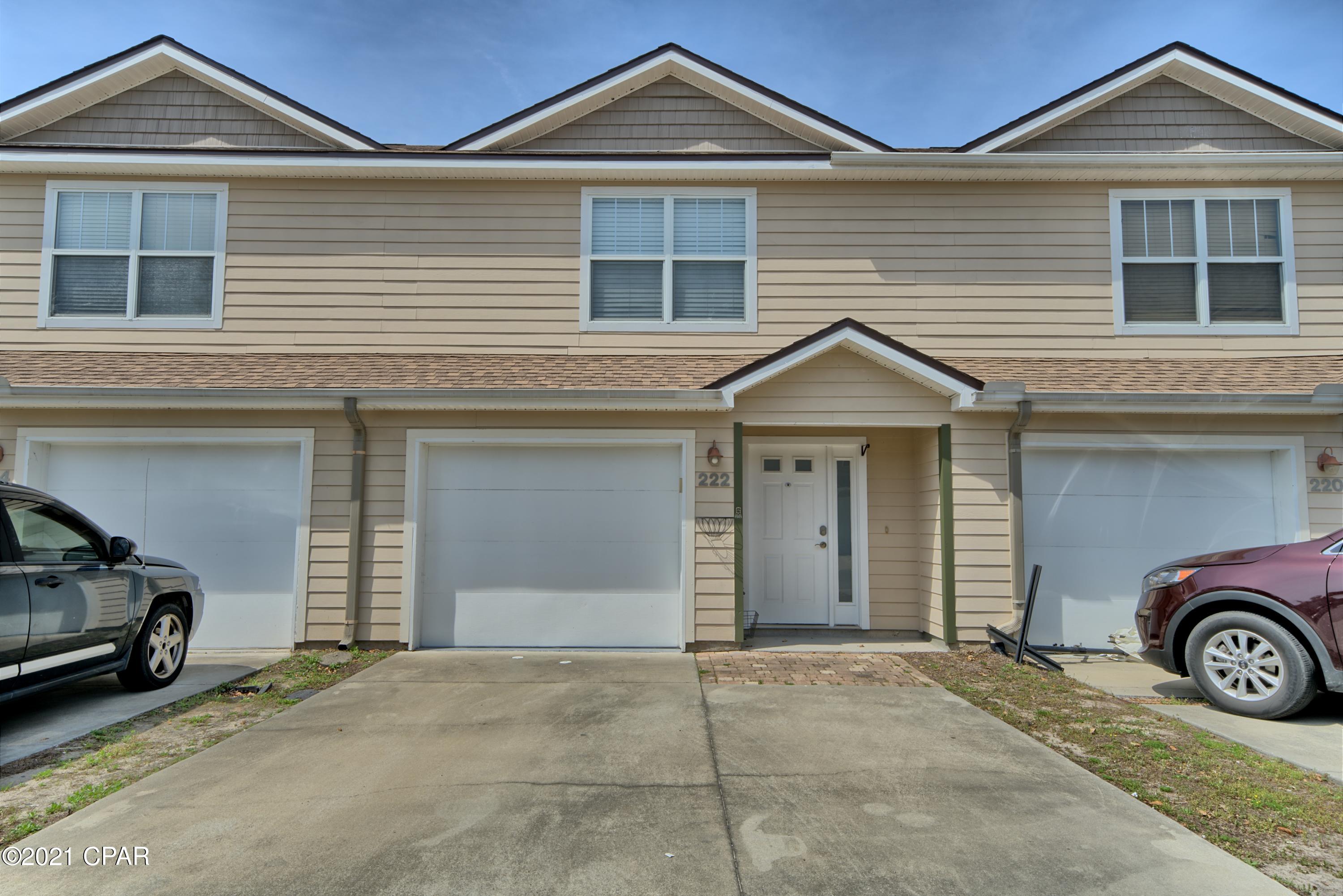 3 bedroom, 2 and 1/2 bath townhome with an attached garage in an excellent location. It's centrally located off of Hwy 22 and close to North Tyndall Parkway. First floor features the kitchen with stainless steal appliances and tile flooring. Attached to the kitchen is the living space plus a convenient half bath. Second floor has three bedrooms with LVP flooring throughout. A good sized master bed contains the ensuite bath with walk-in shower and tile floor. The other two bedrooms share a full bath.  Beautiful French doors open onto the deck area in the backyard. The tall privacy fence is perfect for soaking up the sun and grilling outside. Don't hesitate to schedule your private tour today!
