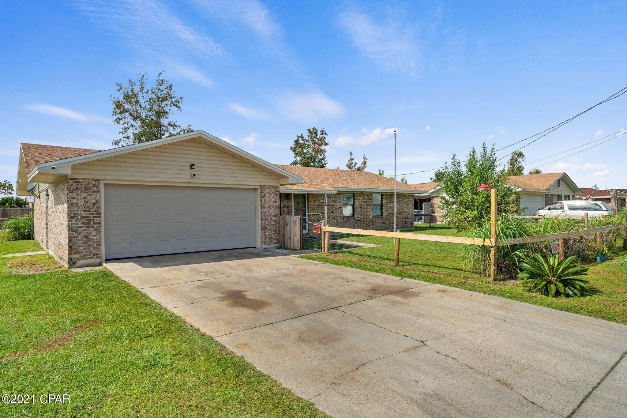 CURRENTLY UNDER CONTRACT, SELLER ACCEPTING BACKUP OFFERS. This corner lot, all brick home sits high and dry and has never been flooded. A rare thing in Bay County! The home has had a lot of work done: new roof, new carpet, top of the line security system with over 12 cameras, new hot water heater, new appliances, and all brand new bathrooms. The yard is completely fenced in on the front and back so your furry friends can utilize the entire quarter acre of land at your leisure! There is even a RV hookup for your camper in the backyard. Come quick, this home will not last long.