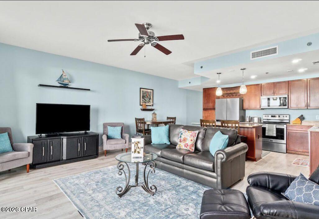 ***A BEST VALUE PRICED UNIT with SOLID RENTAL RETURNS***Calling Investors***
This charming coastal beach condo is move in ready or rental ready if you are looking for a great short term rental unit! This is a 1 big bedroom, 1 bunk room, 2 full bath condo with 1047 sq. ft. of living space. Compare that with other condo complex's and you get more size for your money at Laketown Wharf. Check out the new stainless steel kitchen appliances, granite countertops, and new premium plush carpet in the living areas. Beautiful furniture package is included plus a stacked washer and dryer is included too. The covered balcony is 19'x8' and being on the lower levels eliminates elevator waits and gives you or your guests he best views of the nightly Las Vegas style light show set to music! This unit has direct waterfront lake views from the balcony and is across the street from the GULF with a dedicated deeded access gate & boardwalk through Pineapple Willy's. COA fee's include Cable, Internet, Hazard Property Insurance, Water & Garbage (you basically only pay for power) The most amenities around which include: access to 5 POOLS, Full 2 story GYM, Pickleball Courts, Many restaurants, 24 hour security and gated property. Come experience this one stop destination for your next vacation and a great investment.