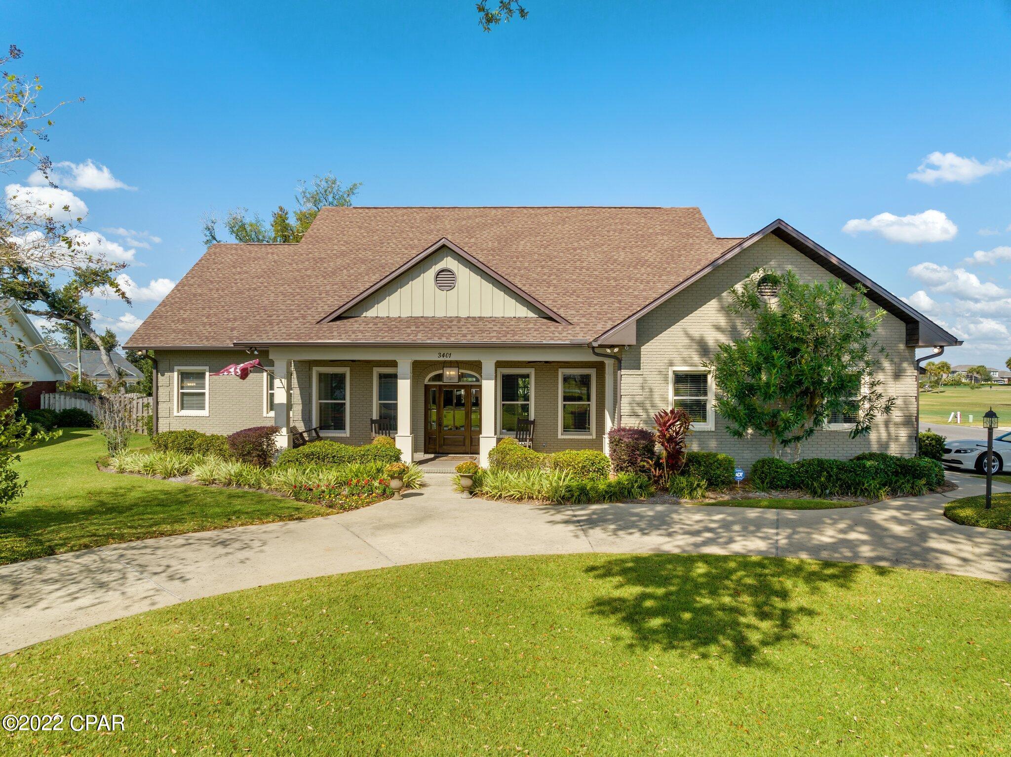 If you're looking for your forever dream home, look no further than this beautiful custom-built home in the desired community of the golf-cart friendly Panama Country Club located in beautiful Lynn Haven, Florida. Located just across the street from North Bay, this home has it all - 6 bedrooms, 2 flex rooms and 4.5 bathrooms, not to mention a gorgeous covered back patio and a large yard equipped with a fire pit and concrete pad.  This home boasts a spacious 3-car garage with dedicated space in the garage for storage. This home also comes equipped with interior and exterior Sonos speakers, a Halo system as well as hard wiring throughout. Come make your dream home a reality with this spacious home situated just a short walk to the neighborhood pool, clubhouse, and the popular golf course!
