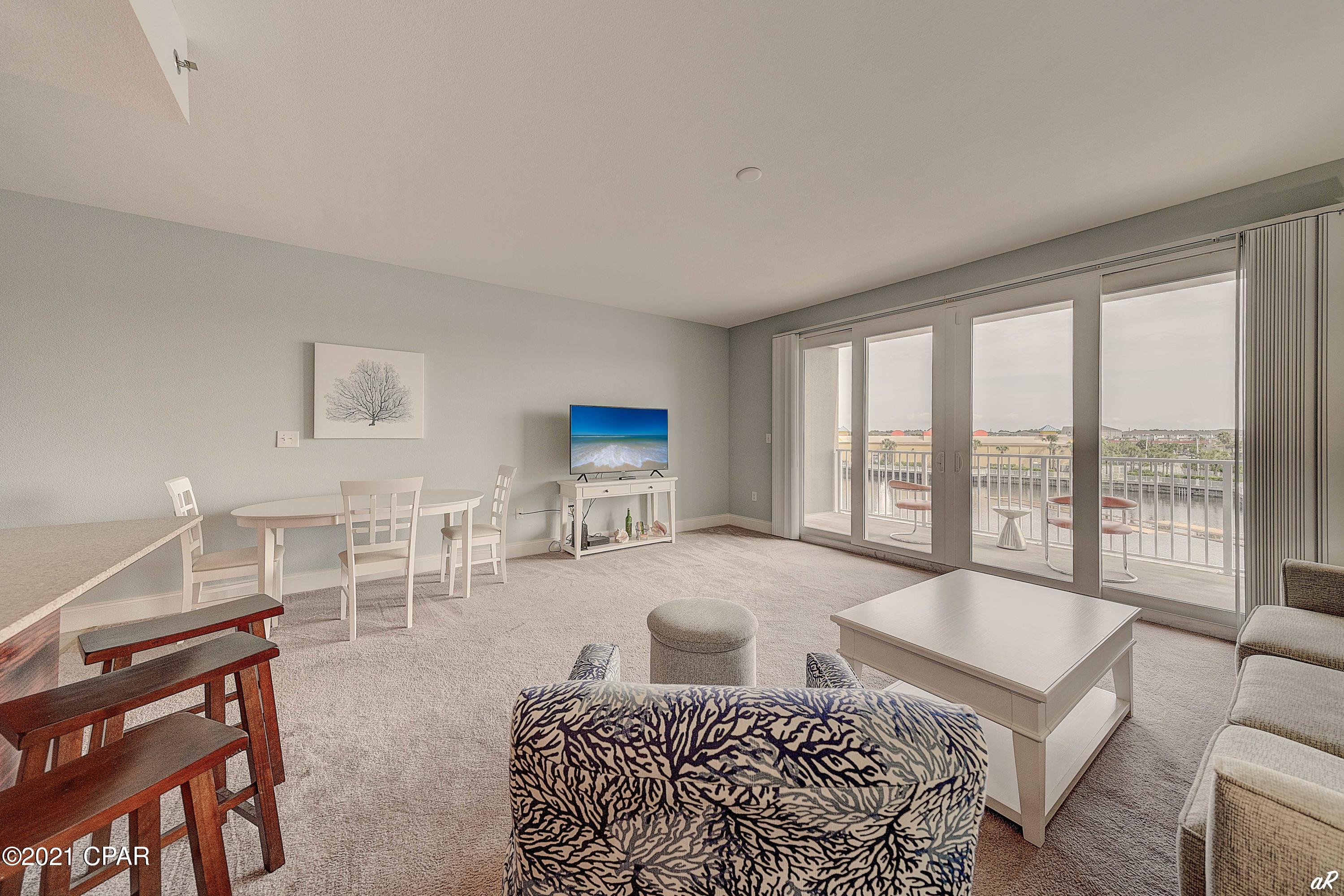 UNDER CONTRACT WITH CONTINGENCIES, SELLER ACCEPTING BACK UP OFFERS.

Welcome to the most desired floor plan in Laketown Wharf.  This 1 bedroom, 2 bathroom with Bunks, fully furnished, lakefront gem is located on the 2nd floor so you don't have to wait on the elevator.  This spectacular, meticulously maintained condo, has never been rented by the owner.  The owner rarely ever comes to the condo, so it is in pristine condition.  The reason why this the most desired floor plan is because of the lake views, and ability to see the evening light shows at Laketown Wharf. You are going to absolutely love the floor plan which boasts 1047 square feet and ample space to spread out.  Buyers are going to see the true value and 6+ person sleeping capacity of this condo and realize strong rental income.  Laketown Wharf is located in The Heart Of All The Fun and excitement In Panama City Beach  Just Steps Away From The World's Most Beautiful White-Sand Beaches, Shopping, Dining and Entertainment. This Beachside Resort Offers Unparalleled Amenities With Convenient Beach Access, 5 Unique Pools, A Kids Funscape Playground, Splash Bar & Grill, Gulf View Fitness Center and Covered Garage Parking. Laketown Wharf Offers A Variety Of Views Including The Gulf Of Mexico, Lake and Golf Course. Enjoy The Nightly Fountain and Light Show and Market Shops Along The 52,000 Square Feet Of Lakefront Boardwalk. 
Features Include: New Furniture, Flooring and Paint, Exceptionally Large Open Floor Plan, Expansive Balcony, Granite Countertops, Fully Applianced Kitchen With Breakfast Bar. 

This is a turnkey investment opportunity, just bring your suitcase and enjoy all this condo has to offer.

Call your Favorite Realtor today for a private showing.