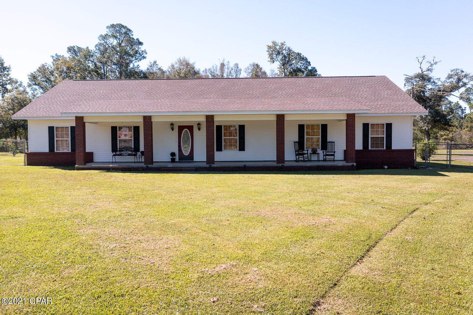 Country Living at its Best! Fish and Hunt on your own 15 acres. There are 3 stocked fish ponds with Bream, Shellcracker and Catfish. Lots of Deer and wild turkeys. Beautiful ranch style home with 2805 sq. ft. with 4 bedrooms, 2 1/2 baths that has plenty of room for your family. The Great room opens to the kitchen with stainless steel appliances, separate pantry, wall oven and breakfast bar. There is additional den that could be used as a 5th bedroom. 48 x 32 Pole barn with 30 amp service for RV with outside shower. 24 x 12 workshop, and 40 x 20 open shed. Fenced yard with Kumquat and Satsuma  trees. Roof replaced in 2019, New HVAC in 2017, and new well installed in 2017 with water softener.