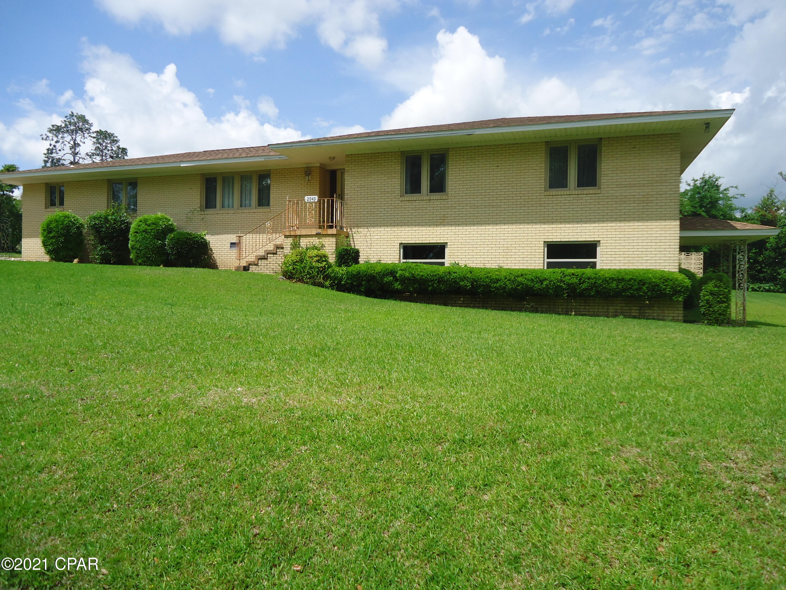 Live within blocks of downtown Marianna in this 4 bedroom 2 bath brick home located on 

 a beautiful corner lot.  There's  plenty of room for a growing family.  Formal Living and Dining rooms, craft room, den and a basement.  There's hardwood flooring in most of the house. If you don't mind a little updating, this is the home to see!