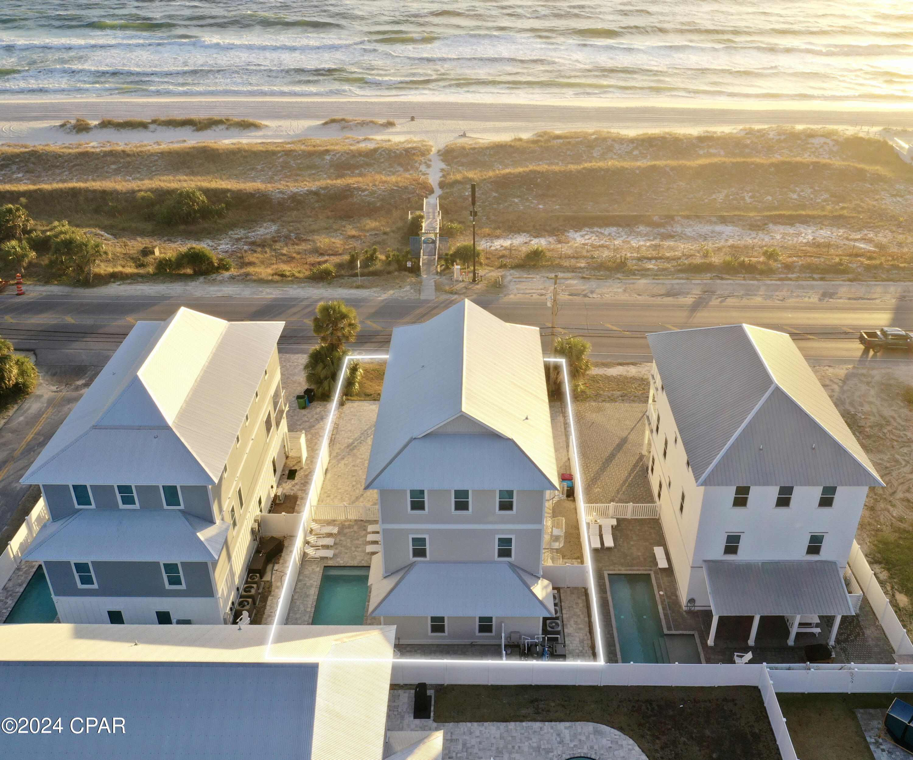 CURRENTLY UNDER CONTRACT, SELLER WILL CONSIDER BACK UP OFFERS ''Heavenly Day'' is a gulf front luxury home built to entertain the entire family with expansive views of the gulf and Bid-a-Wee Beach. Located directly across from the Bid-a-Wee community beach access, Heavenly Day boasts a private heated pool and sprawling decks that offer endless views of white sand beaches and the Gulf of Mexico. There is ample parking with five plus spaces and an outdoor shower to rinse the sand off after a long day at the beach. The interior offers approximately 4,390 square feet and features luxury finishes throughout with 6 Bedrooms, 6.5 Baths and a massive 600ft bunk/rec room. The first level includes an entry leading into the first living room, elevator, bedroom with ensuite bathroom the expansive bunk and recreation room with ensuite bathroom, first floor laundry and one car garage. The second level features the great room, dining area kitchen and pantry as well as a bedroom with ensuite bath and a powder bath. The living room, dining and kitchen have sensational views of the Gulf of Mexico. The third level features the master bedroom with Gulf views, master bath with vanity, two more bedrooms with ensuite bathrooms and a third level laundry room. Located centrally in Panama City Beach in the heart of popular attractions, great dining, unique boutique shopping and nightlife. Easy access to Hwy 98, allowing you to explore nearby Pier Park Shopping Center and quick access to the Northwest Florida Beaches International Airport. Feel free to enjoy all the area has to offer or park your car in the drive and never leave...