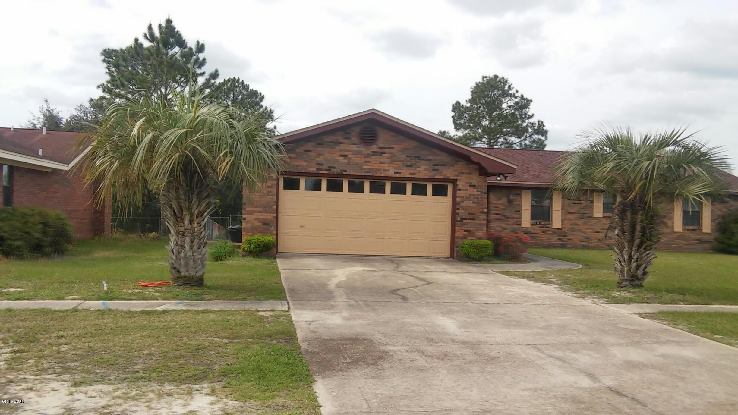 Sought after Neighborhood-Underground utilities- just Min. from Tyndall AFB. This Neighborhood Features  Well Lit Streets and Sidewalks, Enjoy  5 Miles of protected sidewalks with Street Lamps-Just 15 Min. to Tyndall AFB, Schools & Shopping. This Well cared for home features New Roof 2016 ceramic tile throughout-4 Bedroom 2 baths Formal Dining Area and an office. This home will bring you many years of joy-.47 acres that's right almost a 1/2 acre to play in- The large backyard Boast room for a game of Soccer or Football, and there is still room to add a swimming pool. New Roof with wind mitigation- Dec. 2015 All Brick- All Tile and Laminate flooring through out for Low maintenance- and allergies. See this one today you will not be sorry! SELLER PROVIDED 1 YEAR WARRANTY!