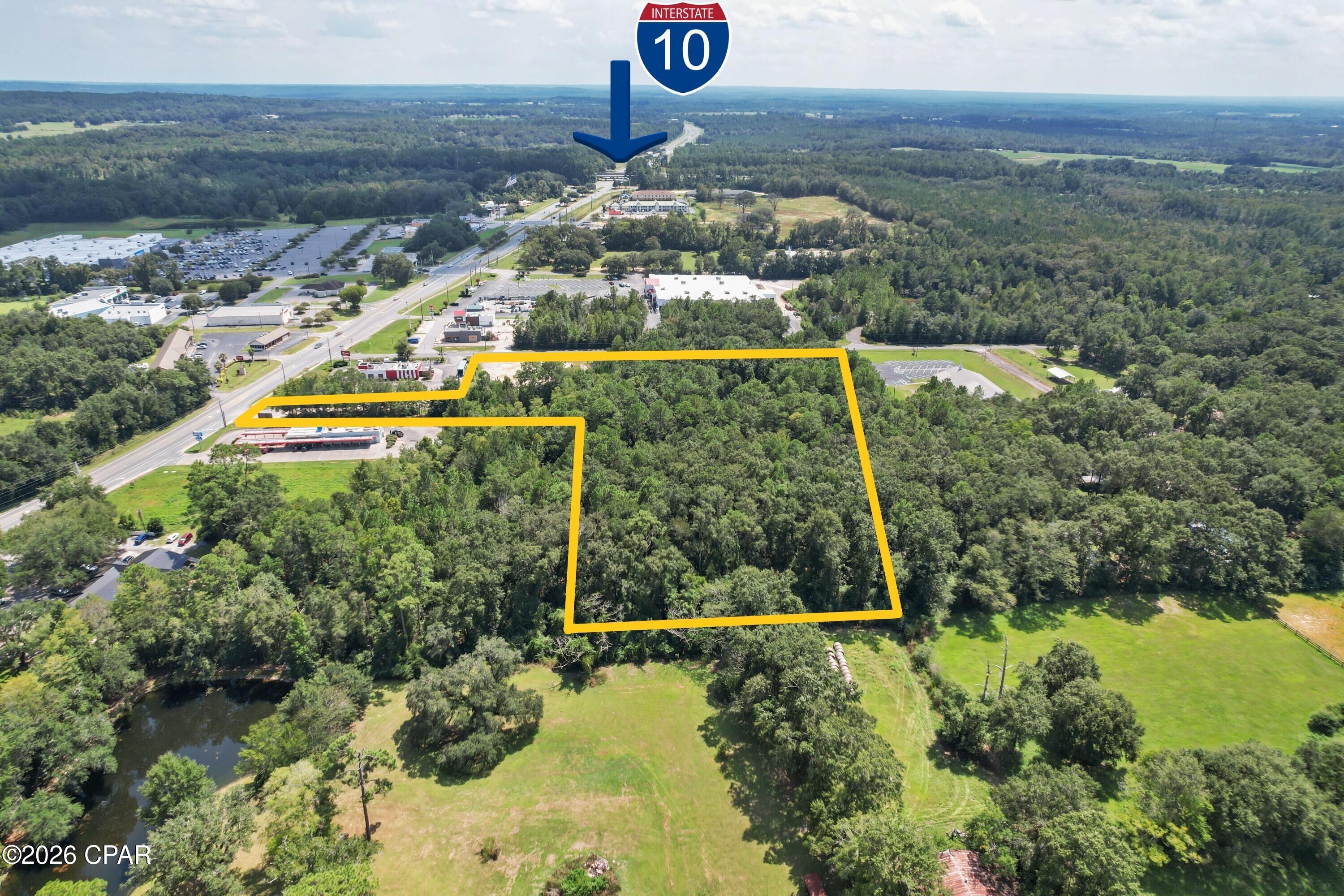8.69 ACRES, PRIME COMMERCIAL DEVELOPMENT OPPORTUNITY IN CHIPLEY!
Position your next project in a growing commercial area with excellent proximity to major national retailers and restaurants including Walmart, KFC, Sonic and more. This 8.69 acre commercial property offers substantial space for development and an outstanding opportunity for retail, restaurant, office, service, or other commercial uses. With nearly nine acres to work with, the property provides flexibility for a larger development, multiple buildings, parking and future expansion. Location, acreage and development potential come together in one exceptional commercial opportunity. Buyer to verify zoning, dimensions and all information deemed important.