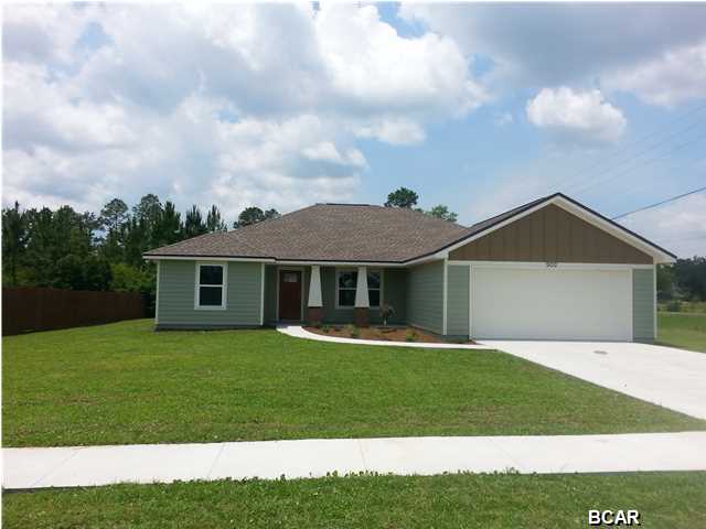 Home is Completed and Move In Ready! If you are looking for a brand new 4 bedroom, 2 bath home on a large corner lot, in a nice, quiet neighborhood, look no further! This beautiful, custom built home is designed with a split bedroom plan w/ very large rooms. This home sits on a large 90 x 120 corner lot and has many great features and upgrades. As you enter the front door, you will notice the large 10ft ceilings in the living room, formal dining room, and spacious kitchen. The kitchen has lots of counter space w/ a breakfast bar, beautiful cabinets and granite counter-tops. The kitchen also offers a nice 4 piece stainless steel appliance package to include a side by side refrigerator, stove, microwave and dishwasher. There is also an eat in breakfast area over looking the back  yard. Beautiful porcelain, brick laid, 12x24 tile can be found throughout the living room, formal dining room, kitchen, laundry room and bathrooms. All 4 bedrooms have frieze carpet. The master bedroom is very spacious w/ boxed ceilings, and a very large walk-in closet. The master bathroom offers a 72 inch double vanity w/ granite counter top, a large garden tub to enjoy a relaxing bath, and a separate tiled shower. The 3 additional bedrooms are located on the other side of the home and each offer lots of room to handle large furniture w/ spacious closets. There are many other desirable features to include: A large two car garage, all electric central heat and air, separate laundry room, manicured yard with irrigation system, and large covered, back and front porch areas. This terrific home is located in a nice subdivision that is very peaceful and quiet. You definitely want to put this on your list of homes to see today! Builder is offering a 1 year builder's warranty that is transferable. Seller is a licensed Florida Realtor.