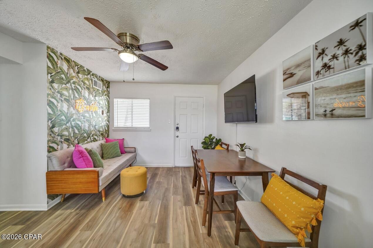 THE ABSOLUTE nicest unit at Ocean Terrace! This 2 bedroom, 1 bathroom unit is ready and turnkey! Fully furnished! Refreshed recently! Beautiful LVP flooring and white shaker style cabinets. Newer bathroom remodel with tiled stand up shower. Community has a pool and private beach access! This unit is on a rental program and is ready for its newest owner. All measurements are approx. and should be verified.
