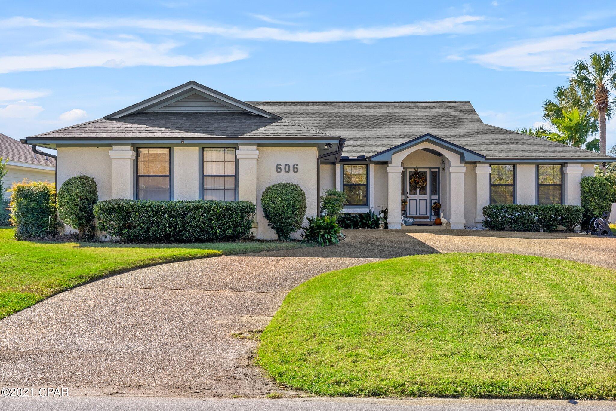 This well-maintained home with a salt-water pool is located on a cul-de-sac in the prestigious community of Bay Point - Panama City Beach, Florida. This home features three bedrooms, two bathrooms, and a large great room with an expansive stone fireplace and built-in bookcases. Also offering a split floor plan, with a jetted soaker tub in the master bath, kitchen with breakfast area, and separate dining room for those special occasions you may have a few times a year. Drive into your carport through your circular driveway, use your outdoor storage and enjoy living in this GATED COMMUNITY with wonderful SECURITY. New Roof installed in 2020. All measurements are deemed correct, buyers should verify if they are important.