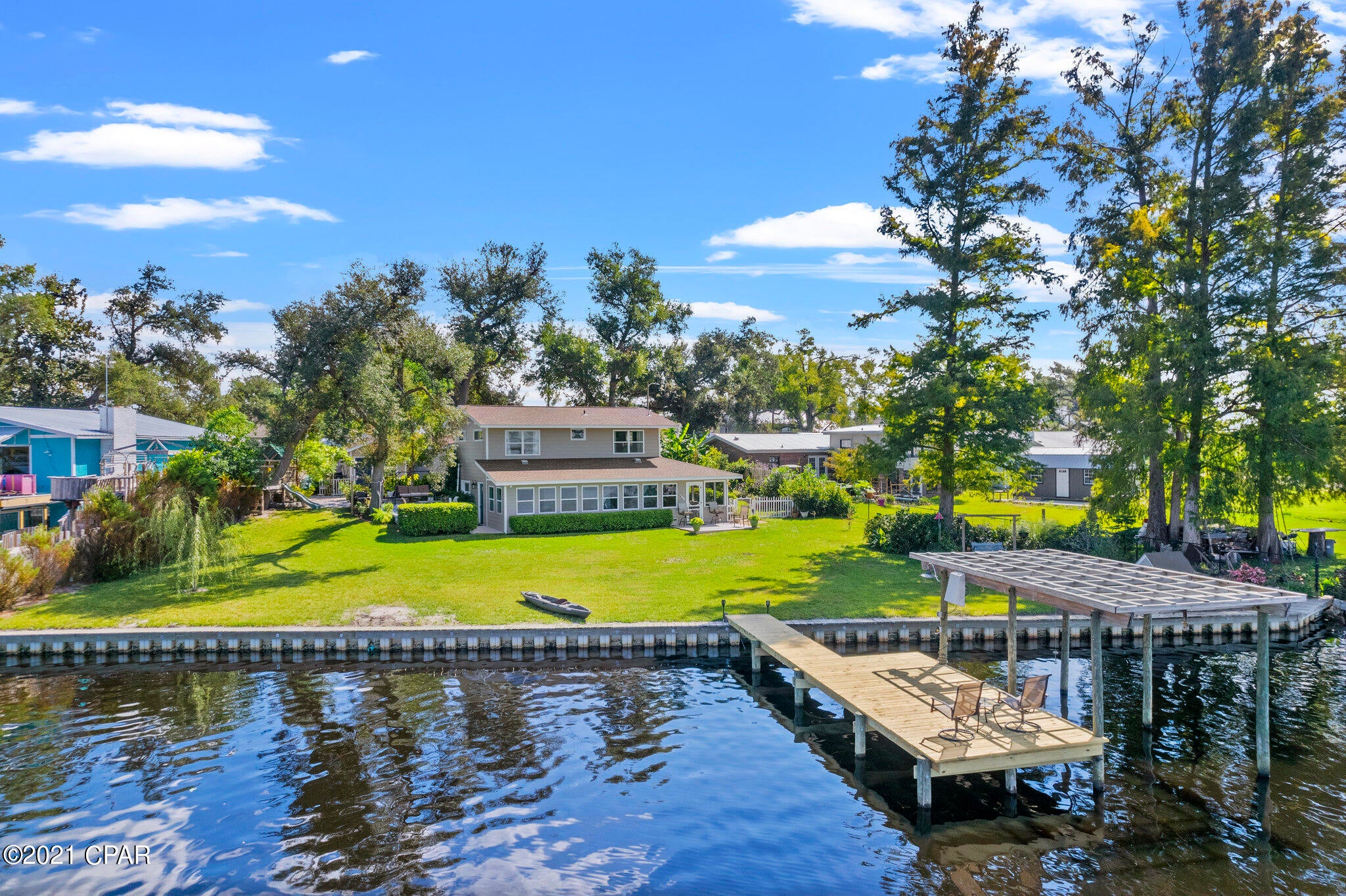 Million dollar lake view! Unique tri-level lake home with 140' of waterfront living. The view is magnificent! Bring your boat, jet skis, kayaks and live the lake life. This 4 bedroom home has so many amazing features you really have to see it to appreciate everything it has to offer. You can drink your morning coffee in so many different places. Which place will you choose first?? Sit out on the brand new dock and fish or catch a sunrise or sunset. Highpoint park with boat ramp is 6 houses down. You have to see it to believe it. Call your favorite realtor to see this property now.