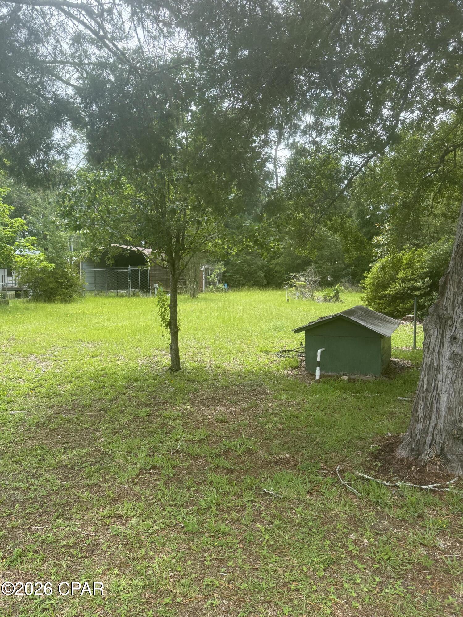Tucked away in the heart of the peaceful Howard Creek community, this vacant lot offers the perfect opportunity to create your own slice of Old Florida. Whether you're dreaming of a quiet fishing retreat, a hunting camp, a barndominium with a spacious pole barn, or your forever home surrounded by nature, this property provides the flexibility to bring your vision to life.

Outdoor enthusiasts will feel right at home. The area is surrounded by thousands of acres of forests, wetlands, and wildlife habitat, making it a haven for fishing, hunting, kayaking, boating, birdwatching, and exploring Florida's natural beauty. Spend your mornings casting a line in nearby creeks and rivers, your afternoons spotting deer, turkey, and other native wildlife, and your evenings enjoying peaceful sunsets beneath the towering pines.

Just a short drive away, the charming coastal town of Apalachicola invites you to experience one of Florida's most beloved hidden gems. Known for its rich maritime history, historic downtown, fresh Gulf seafood, and world-famous oysters, Apalachicola offers waterfront dining, boutique shopping, art galleries, festivals, and beautiful parks. Nearby St. George Island and Cape San Blas provide sugar-white beaches, world-class fishing, boating, and unforgettable sunsets, giving you easy access to some of Florida's most scenic coastline.

Whether you're looking for a weekend escape, an investment opportunity, or a place to build your dream home surrounded by nature, this Howard Creek property delivers the peace, privacy, and outdoor lifestyle that make Florida's Forgotten Coast so special.