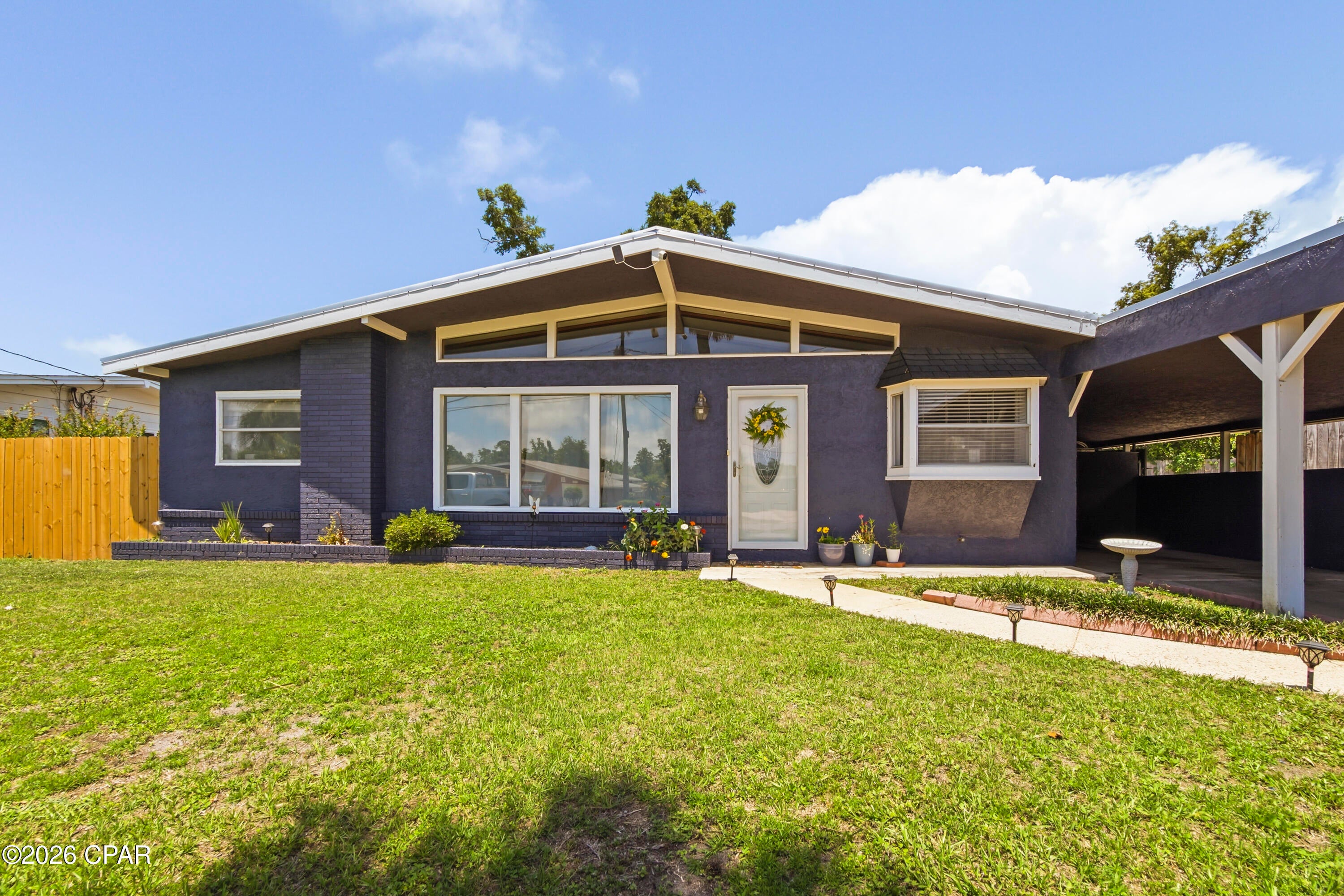 BACK ON THE MARKET, NO FAULT TO SELLER!! The two bonus rooms and laundry room are not included in square footage. Rougly 1800
overallSpacious ranch style home, with tons of natural lighting, located in quiet St. Andrews neighborhood walking distance to St. Andrews bay. This home is centrally located between St Andrews area and downtown Panama City and only a 5 min drive to both! Wonderfully updated with 2019 metal roof, newer kitchen cabinets, granite countertops, stainless steel applicances, paint and flooring throughout, and updated bathrooms as well. Another nice addition was the mini AC splitter system that helps keep the home cooled/heated more efficiently while providing lower power costs. Large Master bedroom with bonus room that could be used as an office or walk-in closet. A Tankless hot water heater was also installed to help with the efficientcy of the home. Another bonus room adjacent to the dining room could be used a nice sitting area or office. Large screened in porch that leads to very spacious backyard with massive storage/work shed and shaded Pergula. The circular drive way and additional parking is great for families or large gatherings. Home was well cared for and it shows!