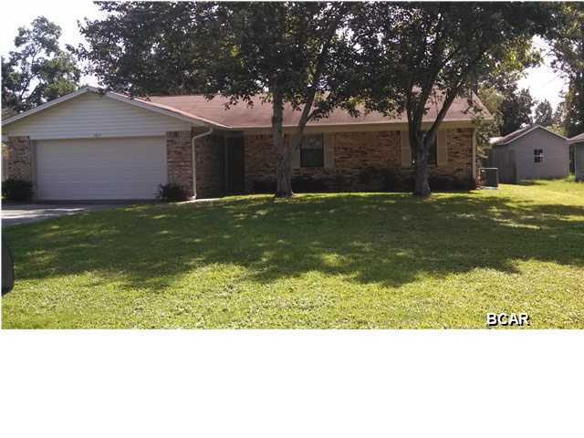 3 BEDROOM, 2 BATH BRICK HOME. 2 CAR GARAGE, FIREPLACE (WOOD BURNING), VAULTED CEILING, COVERED PATIO, WORKSHOP AND PRIVACY FENCED YARD. CLOSE TO TAFB.