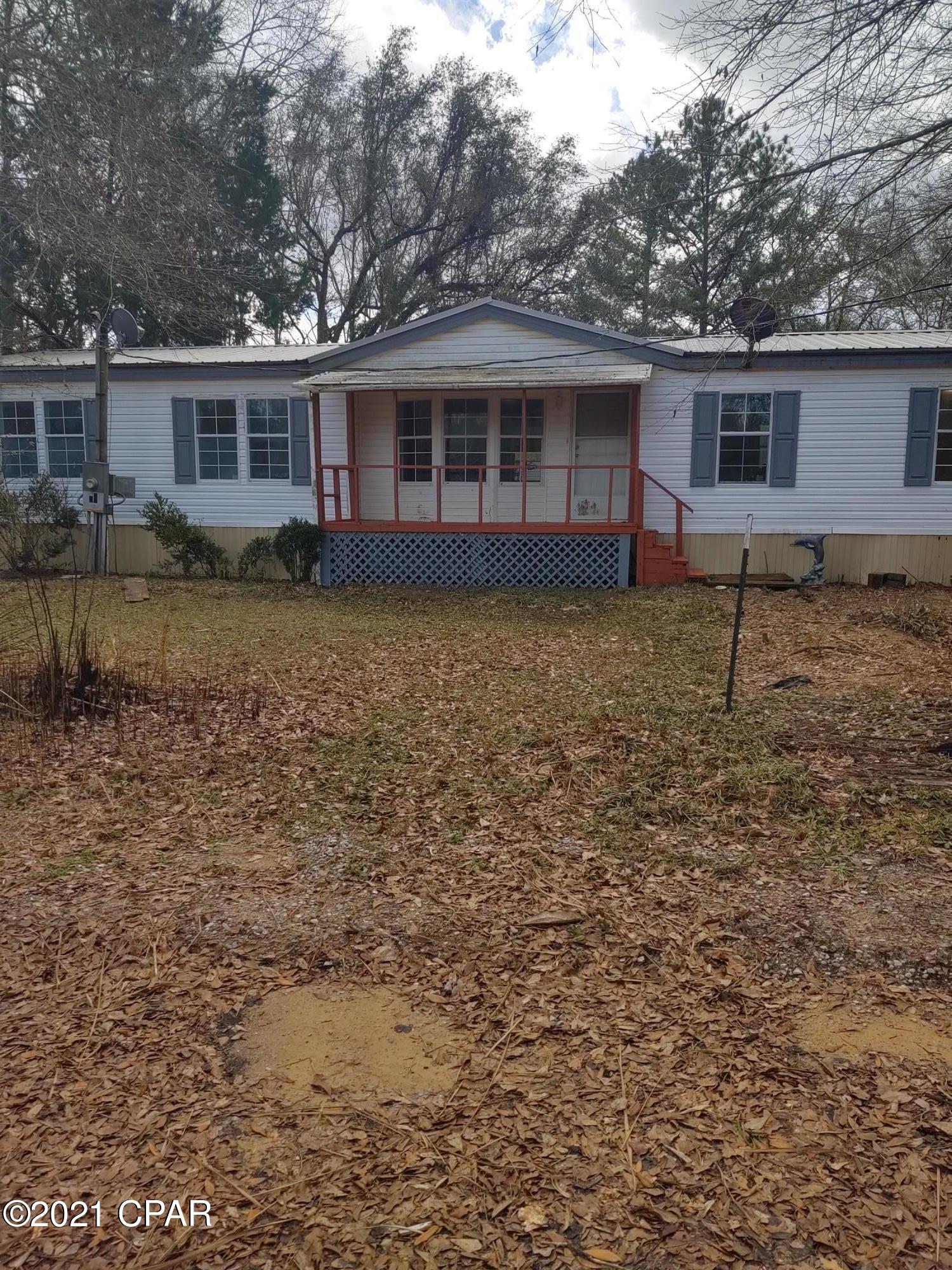 Large 4 BR 2 Bath Mobile Home out in country setting on 1 acre. Home is ready for new family. One years lease required. $50.00 application fee. Easy commute to Panama City Beach.