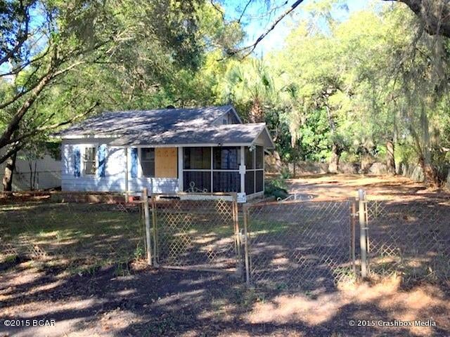 Adorable and affordable, this opportunity property is ready for a new owner.  The cottage sits on a large lot in the gorgeous St. Andrews area of Panama City.  The home has track lighting over the breakfast bar, a screened porch, and an updated bathroom.  This home is THIS close to the bay so you will have a lovely view of the bay when you head home each day.   It's also approximately 5 minutes to 23rd St where you will find shopping, dining, and entertainment and it is also close to schools.  This property is being sold as is.  All information is approximate and should be verified.