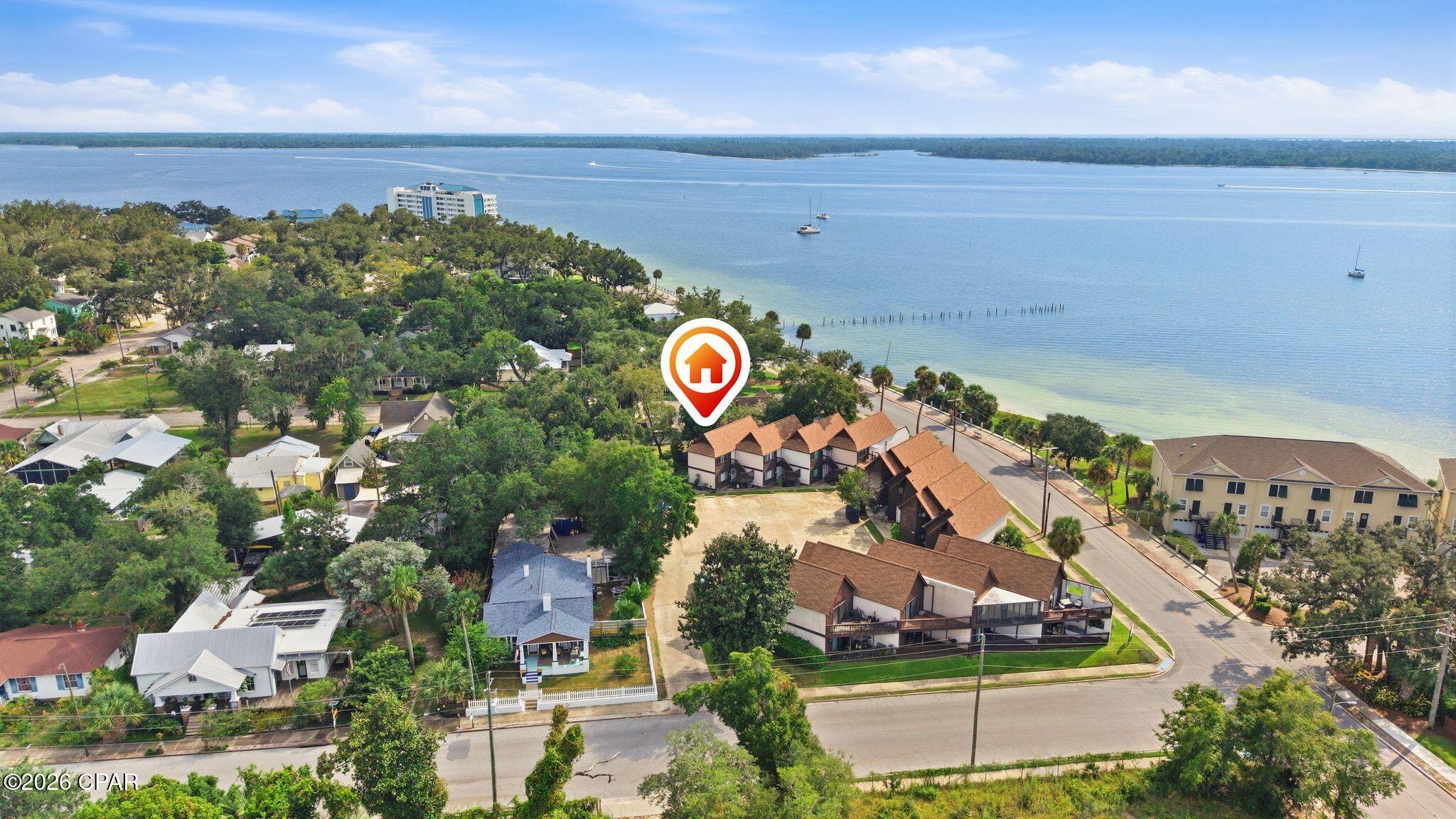 COMING SOON - NO SHOWINGS. Enjoy beautiful bay views and a desirable Cove location close to downtown Panama City, FL from this charming townhouse-style condo. Offering a comfortable and low-maintenance setting, this property is a great option for a primary residence, second home, or investment property. The water view adds to the appeal, while the convenient location puts you just minutes from Downtown Panama City, with easy access to local dining, shopping, entertainment, and waterfront activities. Whether you're looking for a place to call home or a property with rental potential, this cute condo offers a great combination of location, views, and versatility in one of Panama City's most sought-after areas.
