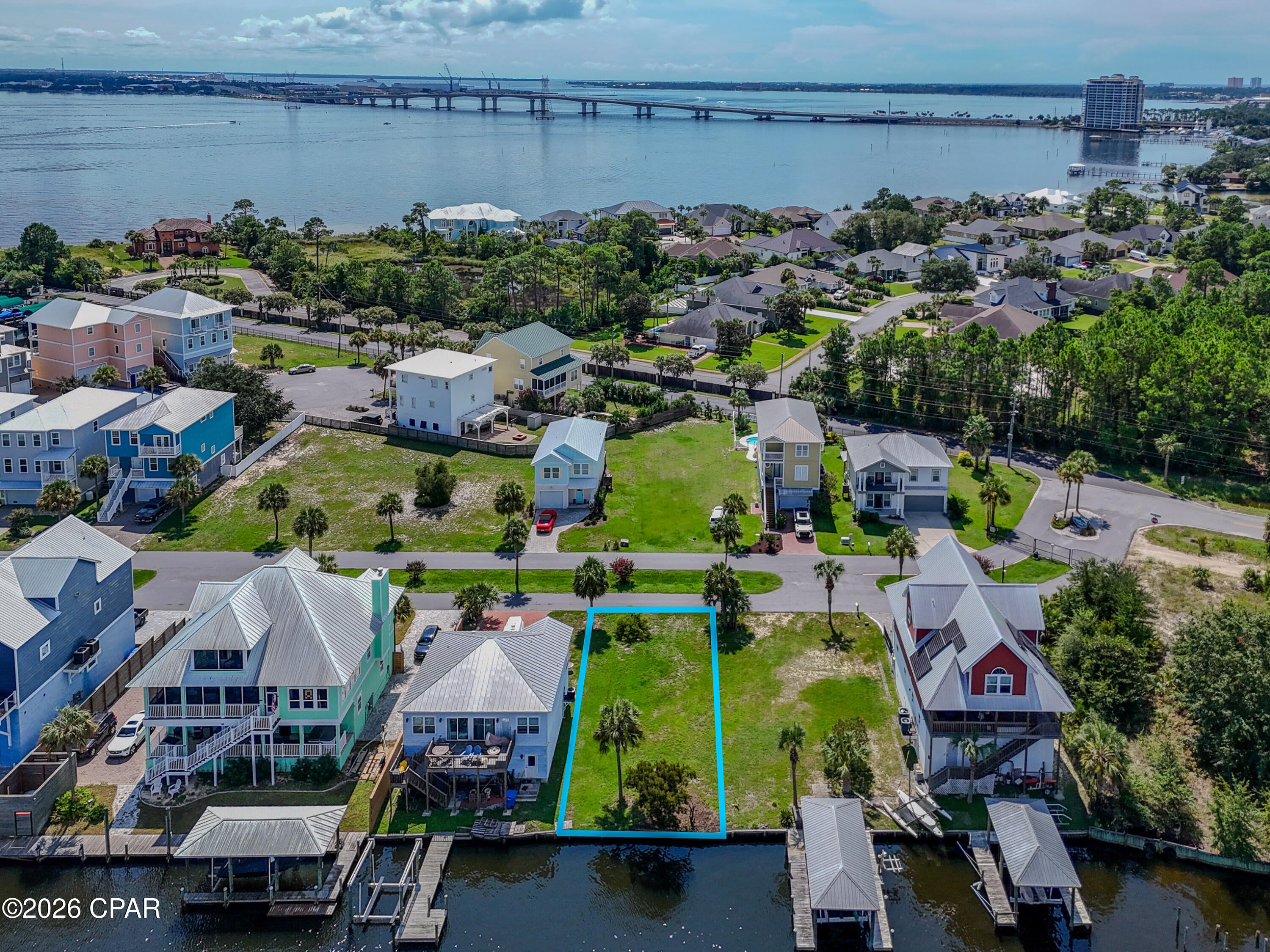 WATERFRONT DEEP CANAL LOT IN PANAMA CITY BEACH close to Pier Park, Duplin Winery. Lot is cleared and ready to build. The lot will allow for a dock for your boat with easy access to the Bay, Shell Island and the Gulf of America.  Harbour Cove Village is a gated waterfront community tucked into a protected canal. 
Call today for a viewing.
