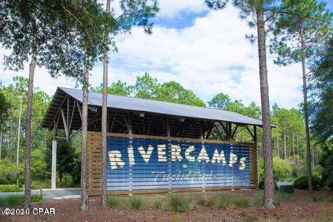 Here's your opportunity to live in Paradise! Rivercamps on Crooked Creek is a St Joe planned community located in a tranquil environment with amazing amenities and close to the beach and Pier Park. Amenities include the Riverhouse (community room), gym, walkin pool, playground, pickleball court, volleyball area, boat storage, boat ramp, walking trails, SUP,  bikes, canoes, camp grounds, and so much more! This lot is over half an acre and is close to the Riverhouse, pool, and bay!