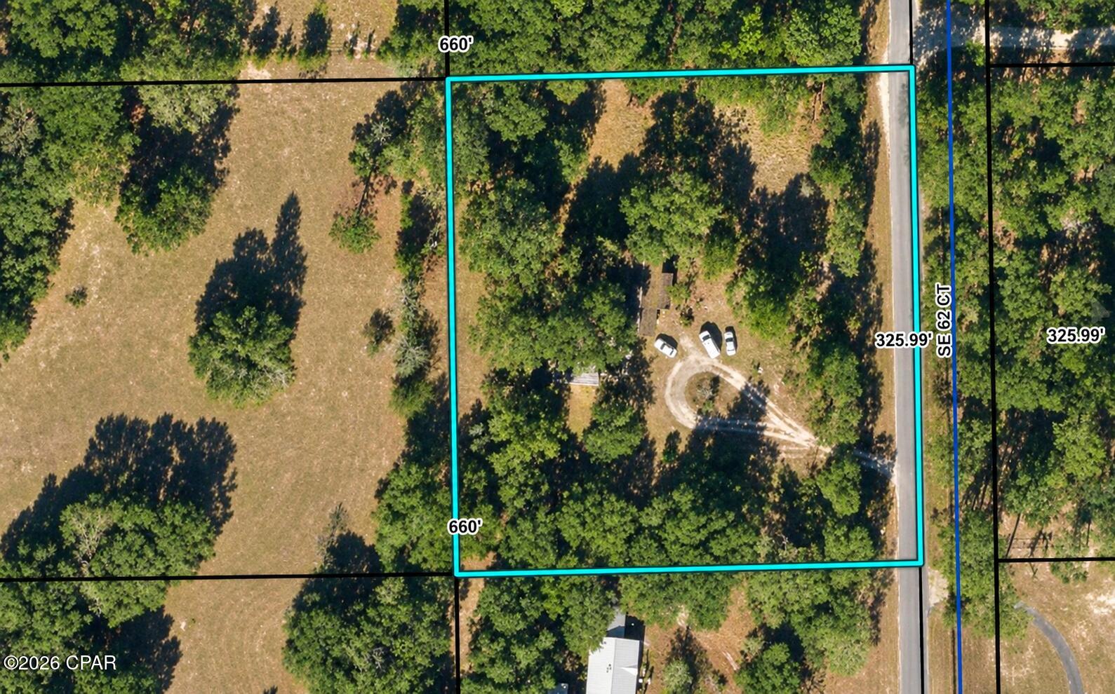 Discover the possibilities of this 2.46-acre property in Trenton! Surrounded by mature trees and natural Florida beauty, the fully fenced property offers a peaceful and private setting. Electricity and septic are already in place, giving you a valuable head start toward bringing your vision to life. With plenty of room for outdoor living, gardening, recreation, or simply enjoying the space and privacy, this property is ready for someone's dreams to become reality.