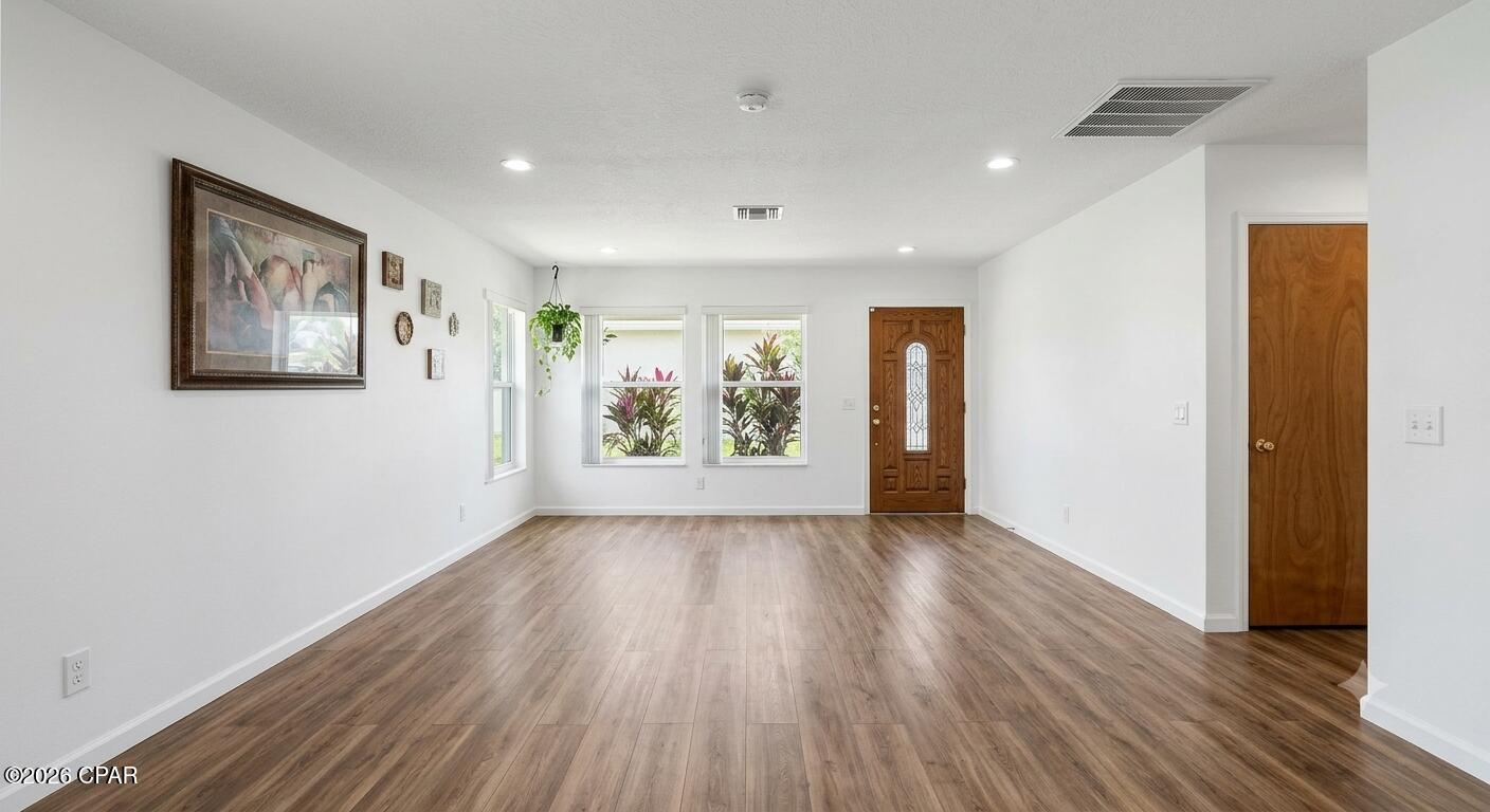 Calling all first-time homebuyers and investors! This move-in-ready 2-bedroom, 2-bath attached home is full of potential and ready for your personal touch. Whether you're looking for an affordable place to call home or your next investment opportunity, this property offers the chance to add your own style while building equity.



A standout feature is the detached shed, complete with electricity, internet, and soundproofing--making it the perfect home office, workshop, studio, or hobby space. Additional updates include a updated LVP flooring throughout the home 2022 and 2023 water heater. The home is connected to city water and sewer. 



A rare bonus is the ability to park a small RV, boat, or jet skis in your backyard with access through the city easement located one unit over, providing added convenience for outdoor enthusiasts.



Ideally located in the heart of Lynn Haven, you'll be just minutes from shopping, restaurants, schools, parks, and everyday amenities. Don't miss this opportunity to own a home with incredible potential in a prime location!