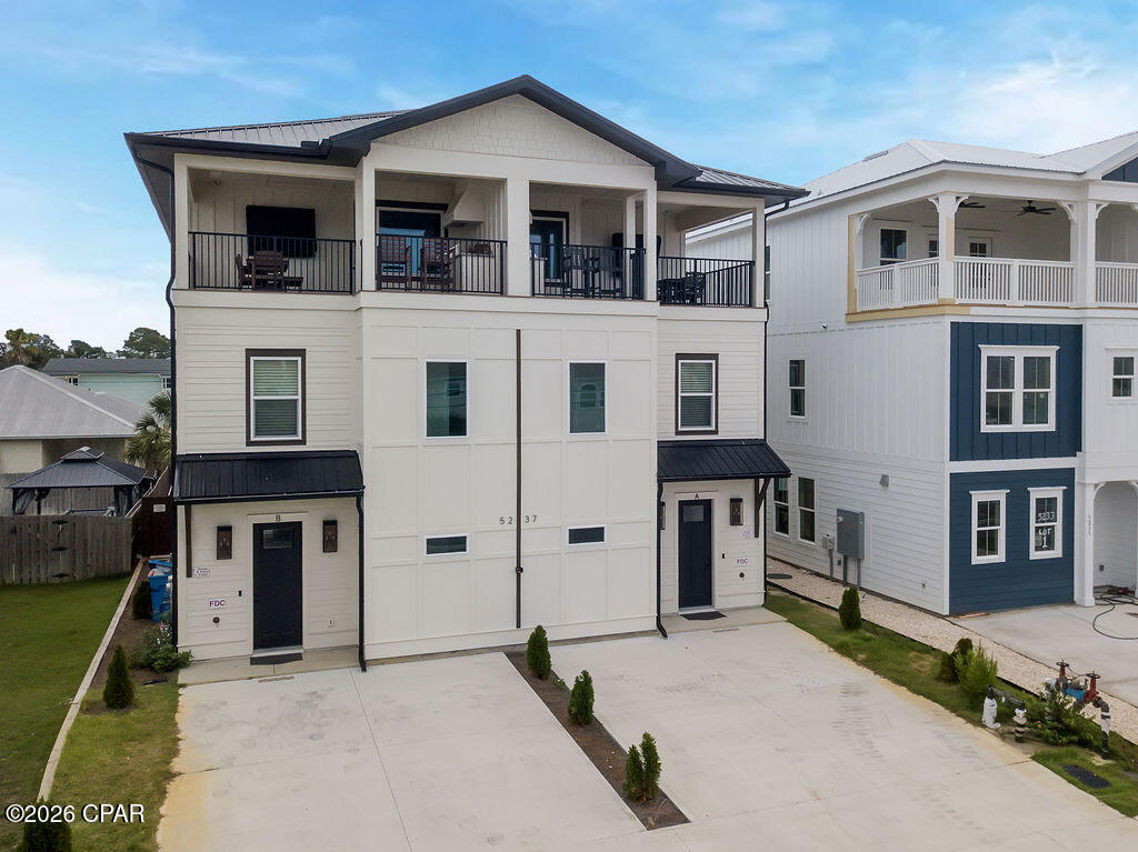This brand-new, purpose-built vacation rental duplex on Thomas Drive is a rare turnkey investment opportunity in one of Panama City Beach's most desirable corridors -- and it's priced below appraised value. Constructed to the highest standards and designed from the ground up to maximize rental income, this fully furnished and professionally decorated property is ready to perform from day one.
Each side of the duplex features 5 bedrooms, 4 full baths, and 1 half bath across three thoughtfully designed floors. The first floor welcomes guests with a stylish living area, a sleek modern kitchen, and a back porch patio opening to a meticulously paved private backyard. There, each unit has its own in-ground saltwater pool with a natural gas heater and remote control -- a premium amenity that drives top rental rates and keeps bookings strong throughout the season. The oversized lot is fully fenced, with a privacy divider between each side giving guests their own secluded retreat.
Head upstairs to find a large master suite with an immaculate en-suite bath, two additional guest bedrooms -- one featuring built-in bunk beds perfect for families -- plus a dedicated laundry room, ample storage, and luggage areas on every level. The third floor crowns the property with another spacious master bedroom and en-suite bath, plus an additional guest room. Step out onto the large balcony and take in panoramic Gulf views while grilling on the built-in natural gas grill -- the ultimate beach party space for guests who want to entertain in style.
The property is fully furnished and decorated by two leading designers, turnkey for short or long-term rental operations. A full fire suppression system reflects the level of quality and attention to detail that sets this build apart from anything else at this price point.
Situated just moments from pristine white sandy beaches, St. Andrews State Park, and a variety of renowned restaurants and shopping, this property delivers the location, amenities, and income potential that serious investors are looking for. The second you walk in this one, you can feel the quality of the build and the materials used, this property is truly a must see to appreciate!!!
Buyer to verify all square footage, zoning, and rental regulations. All information deemed reliable but not guaranteed.