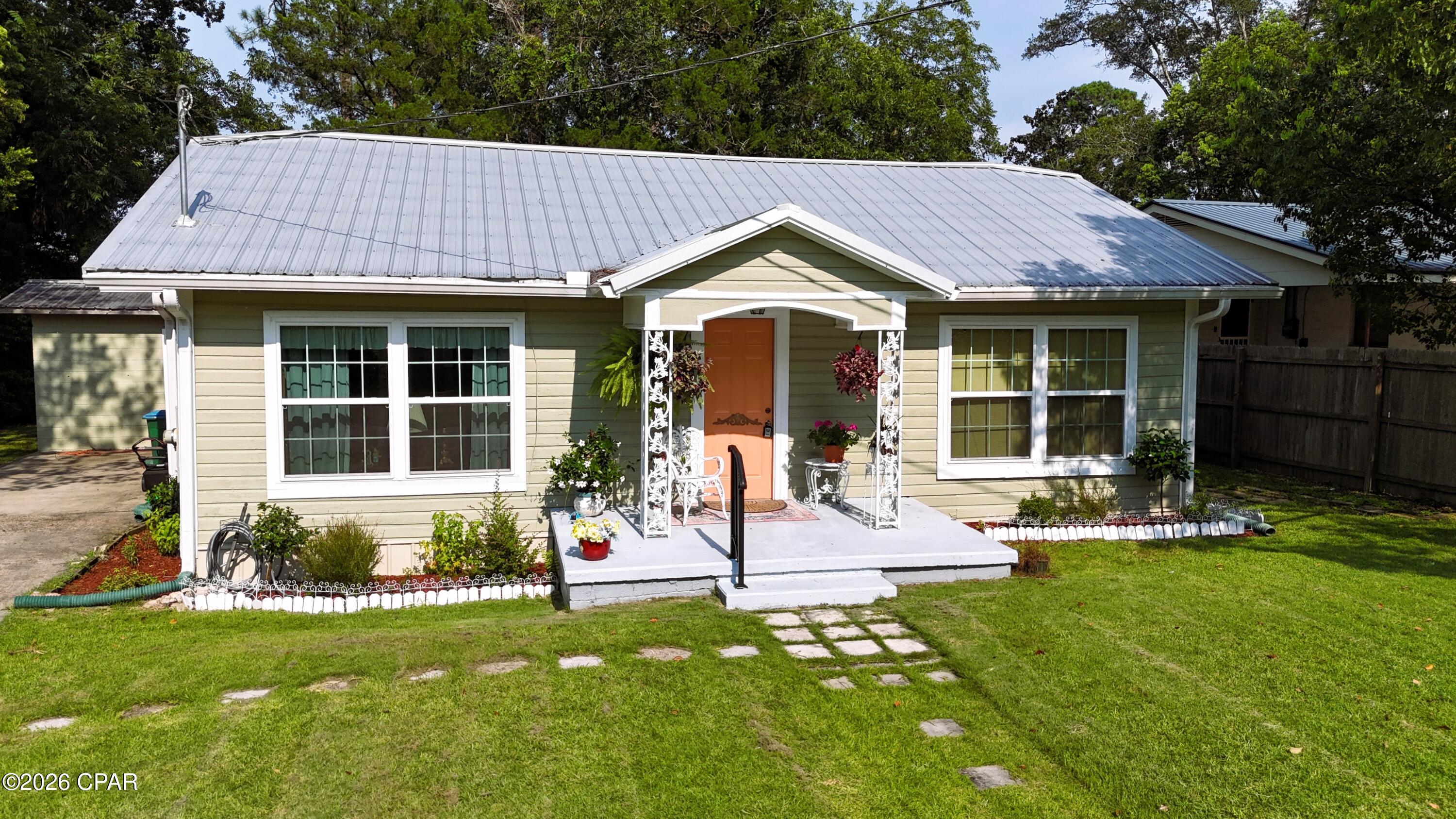 Step into charm with this meticulously maintained 3-bedroom, 1-bathroom home right in the heart of Bonifay, FL. Located on a quiet, peaceful city street, this cozy residence beautifully pairs town conveniences with classic character. Bonus: All furniture in the home is completely negotiable, making this a true turn-key opportunity! You will fall in love with the stunning, original old hardwood floors and the warm, inviting ambiance of the gas fireplace. The property features a small yet generously sized backyard--perfect for pets, gardening, or relaxing without hours of weekend yard work. Enjoy the absolute peace of a quiet neighborhood while being just a short, 52-minute drive from the world's most beautiful beaches in Panama City. Move-in ready and full of love, this home is perfect for first-time buyers, downsizers, or investors!