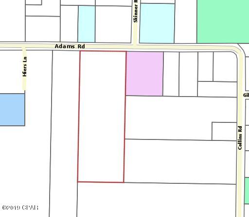 7.2 acres. To the Sellers knowledge: 

There are remnants of a couple of sheds toward the back of the lot. I think there are 1, if not 2 wells that had been drilled years ago. Their viability is unknown. Cyclone fencing surrounds a good portion of the lot and there is some sort of pen near the sheds. Of course the buildings and fencing has suffered variable amounts of damage from hurricane Michael and general lack of maintenance.  Beyond the sheds is a low area where water pools at times. There is a small concrete slab not far from the sheds (a little north?) that is covered by leaves and debris. There used to be a septic system nearby associated with a trailer, but it is not likely of use any more. On the east side, there is some sort of electric service line, near the property boundary.