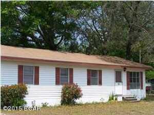 This 3 bedroom 2 bath sits on a large corner consisting of 4 lots. Home has been  fully  remodeled with new hardwood oak  flooring, central air  and carpet.  Large kitchen and separate dinning room. New roof installed and home comes with a termite bond.  Great location close to Tyndall A.F.B.  Perfect first time buyer home or investment.  At this price, wont last long.