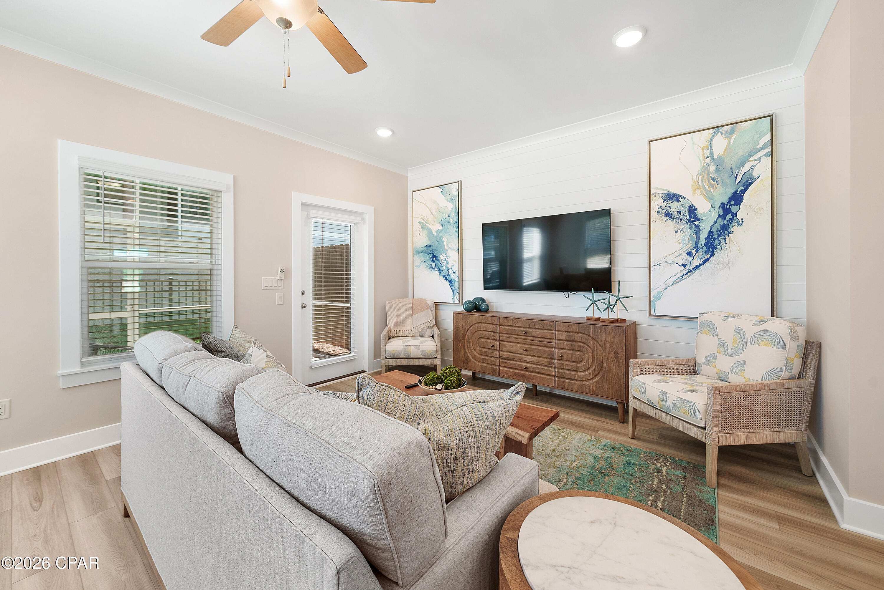 NO RENTAL RESTRICTIONS!!! Our stunning pool is NOW OPEN! The prefect place to SOAK UP THAT Florida SUN! Seagate at Clara is a new townhome community nestled in the vibrant city of Panama City Beach, FL. This two-story unit features board and batten exterior and covered entries. One car garage provides a great space for storing beach essentials. This open concept townhome boasts a stylish kitchen with white cabinets, tile backsplash, a large island with quartz counter tops - perfect for entertaining.  The elegant Owners Suite is designed with comfort in mind showcasing a large walk in closet and double- bowl vanities. Main Bath has tiled shower.  All bathrooms have quartz countertops.  LVP is located throughout the home.  The community pool features a cabana, lounging, seating and grilling stations. This community has a dedicated dog park. Seagate at Clara is in a prime location, approximately 1.4 miles to the sandy beaches and just minutes from Pier Park.