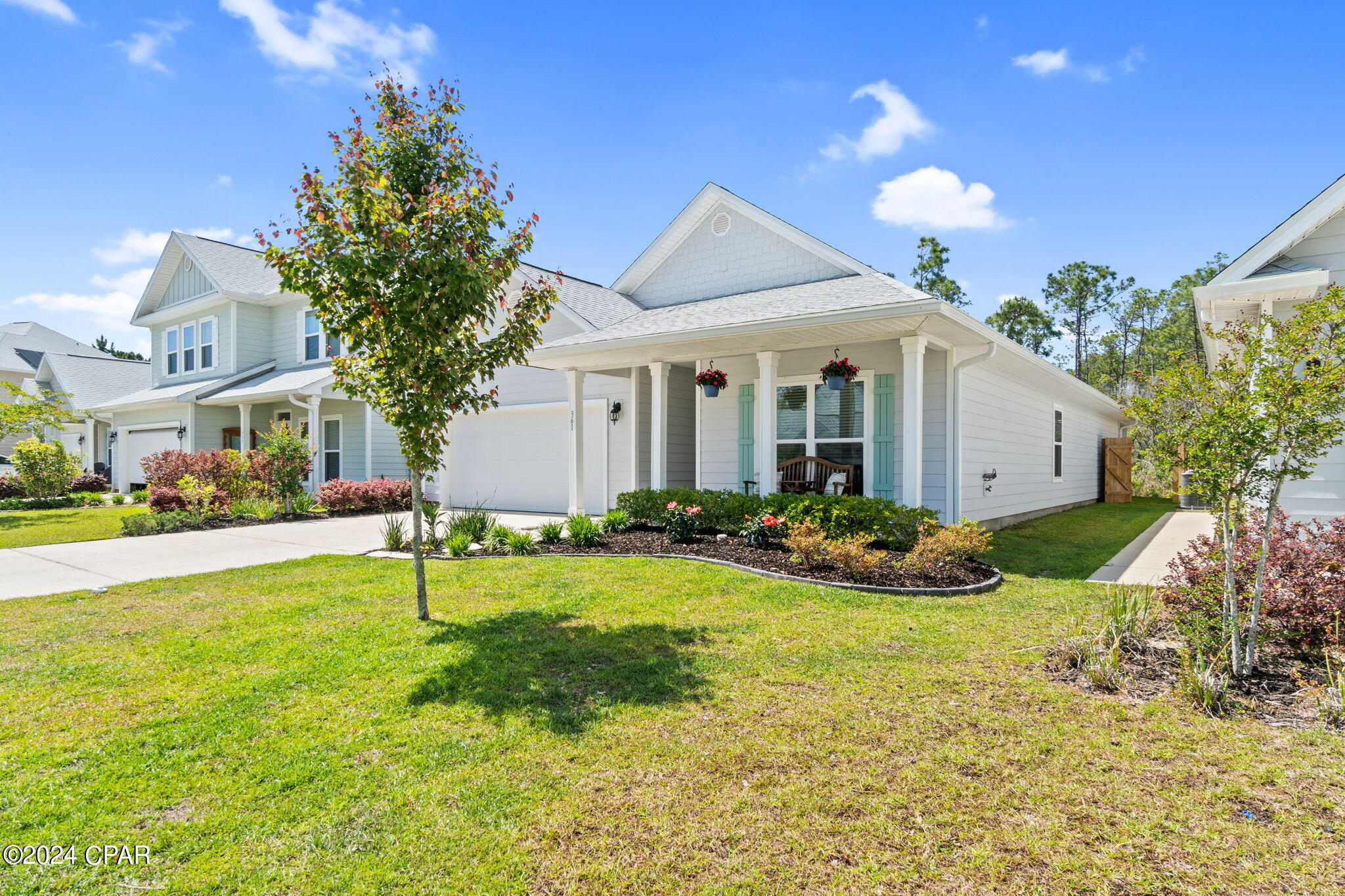 CURRENTLY UNDER CONTRACT...SELLER CONSIDERING BACK UP OFFERS!!! Coastal Craftsman Gem in Emerald Cove Villas in Panama City Beach, FL! Welcome to your dream home in the highly desirable community of Emerald Cove Villas! This elegant 4-bedroom, 2-bathroom one-story Coastal Craftsman-style home offers 2,018 square feet of spacious, open-concept living. Built in 2020, this newer construction residence combines modern comfort with timeless design. Pride of ownership is very apparent as this home has only had one owner and while rentals are allowed in this neighborhood, this home has never been rented. 
In the gourmet kitchen prepare meals in style with stainless steel appliances, a large island with accent painting, granite countertops, a tile backsplash, a farmhouse sink, pendant lighting, and a spacious pantry.
Retreat to your own private sanctuary in the luxurious master en suite featuring a double vanity with granite countertops, two large walk-in closets, a roomy shower, and a water closet.
Additional custom upgrades include the addition of cabinets and a tile accent wall in the laundry room
With Smart Home Technology already built in, enjoy the latest in home automation for added convenience and security.
This lot backs up to wetlands creating a serene backyard with mature trees, providing a tranquil, natural view.
Relax on the covered front porch or the expansive back patio, perfect for entertaining and overlooking the lush greenery, butterfly flower garden, and vegetable garden.
This home comes with an attached 2-car garage for secure parking and extra storage.
Just 3 short miles from the World's Most Beautiful Beaches and even closer to four marinas and several public boat ramps, Gulf Coast State College, FSU Panama City Campus, and the Port of Panama City.
Convenient access to shopping, dining, and entertainment options.
Street lighting, sidewalks, underground utilities, and a neighborhood dog park make this friendly neighborhood feel like home.
This remarkable home blends luxury, convenience, and natural beauty. Don't miss the opportunity to call this exceptional property your own! Verify measurements if important.
