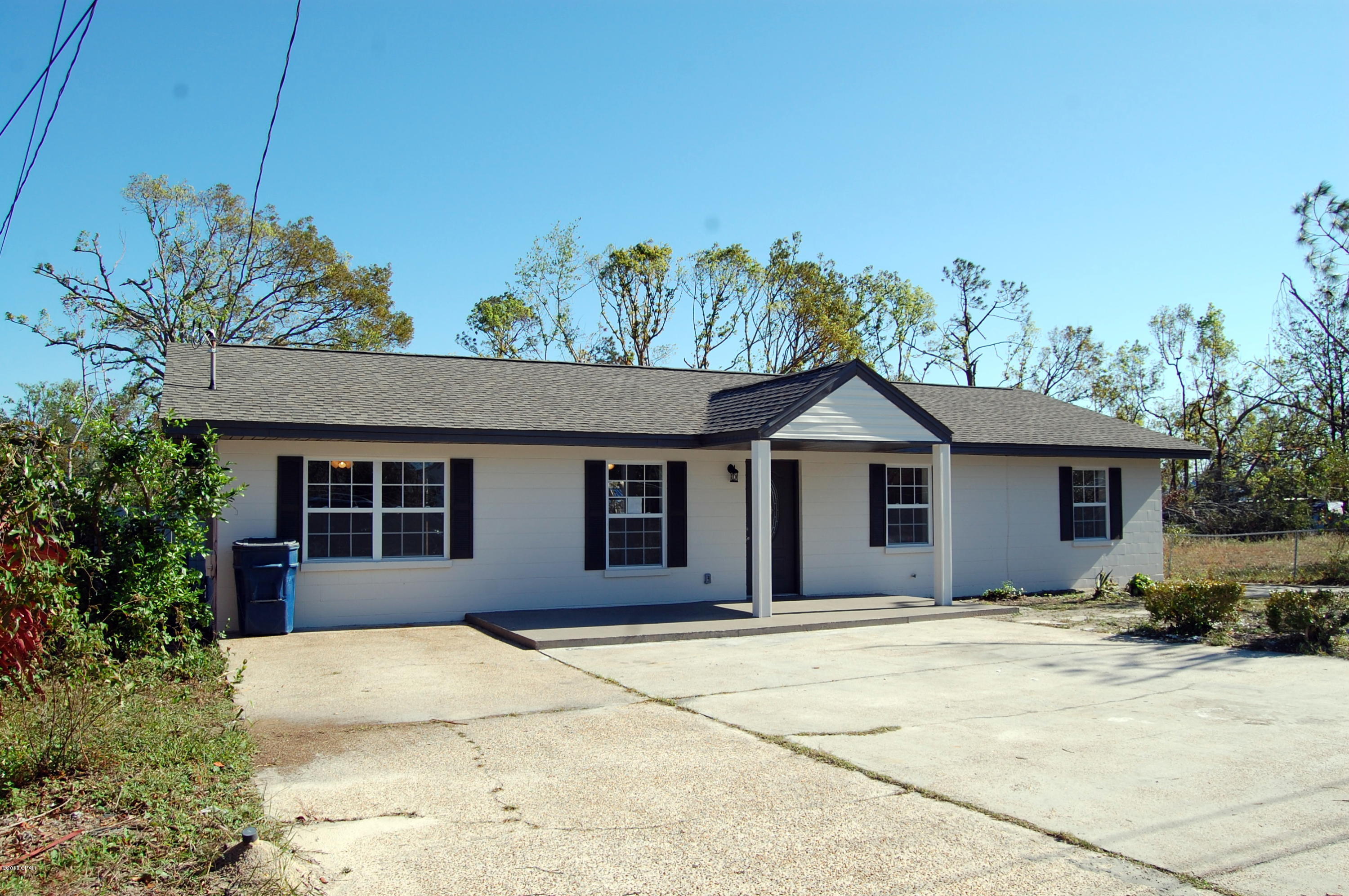 Totally updated ranch home that features new roof and windows, A/C, water heater, granite countertops, laminate floors throughout, etc.