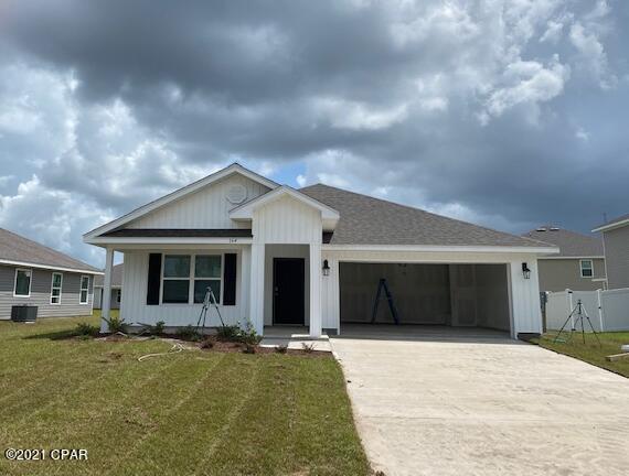 CURRENTLY UNDER CONTRACT, SELLER ACCEPTING BACKUP OFFERS! Come experience serene, country living at Hodges Bayou! This community is just a short drive to nearby schools, restaurants, entertainment, white-sand beaches and turquoise seas. The Cali floor plan features 4 bedrooms with one that can be used as a den or office. This home has quality paint with orange peel textured walls and traditional 8' ceilings. Vinyl flooring throughout all common areas of the home and carpet in the bedrooms. The kitchen is open and spacious with a center island and includes a pantry, beautiful stained cabinetry and durable laminate countertops. The appliances include a dishwasher, stove and microwave. Bedroom 1 has a nice sized bath with separate shower and large soak tub, as well as a large walk-in closet.